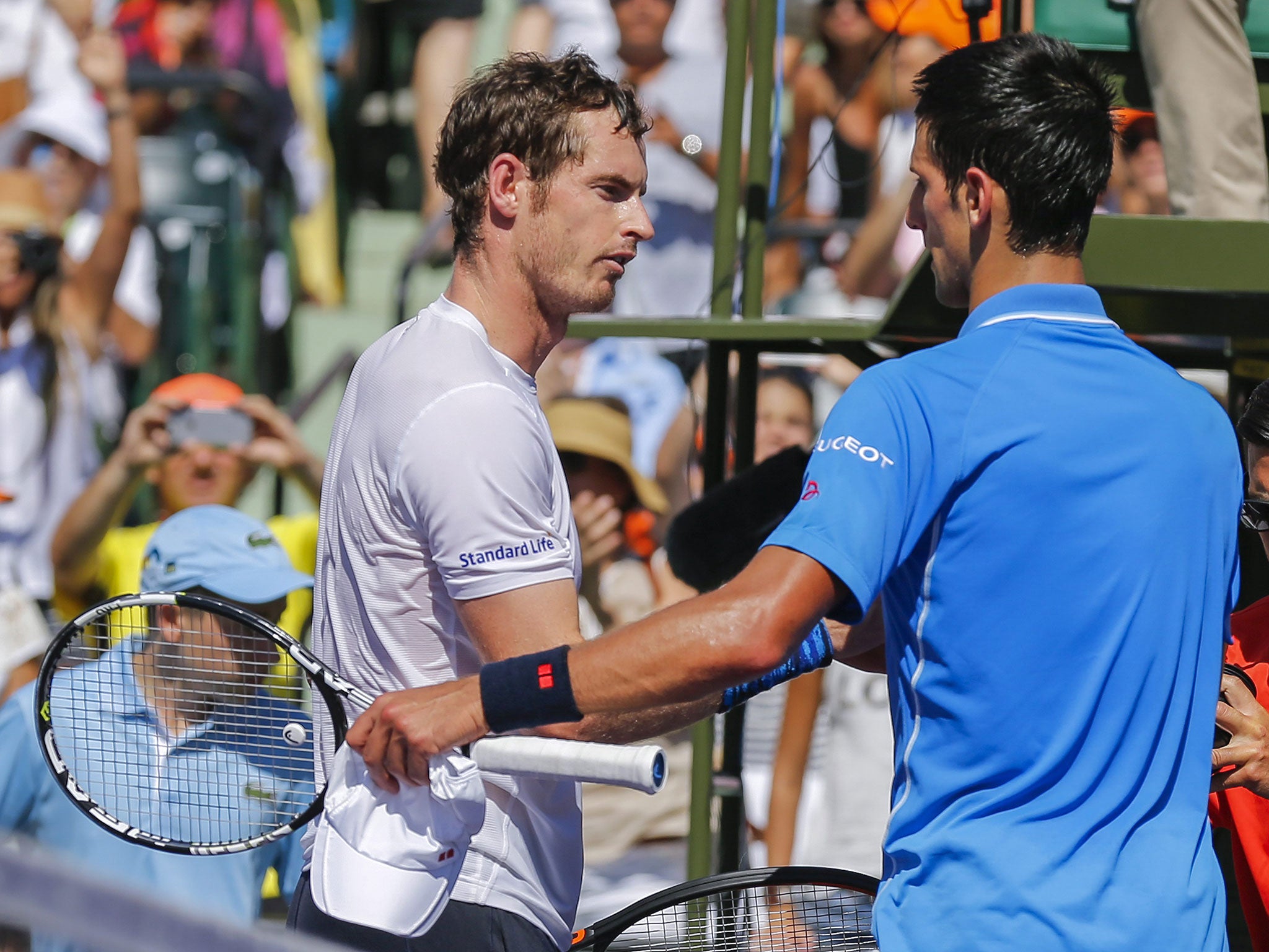 Novak Djokovic, right, Andy Murray, left, after Djokovic defeated Murray in the final of the Miami Open