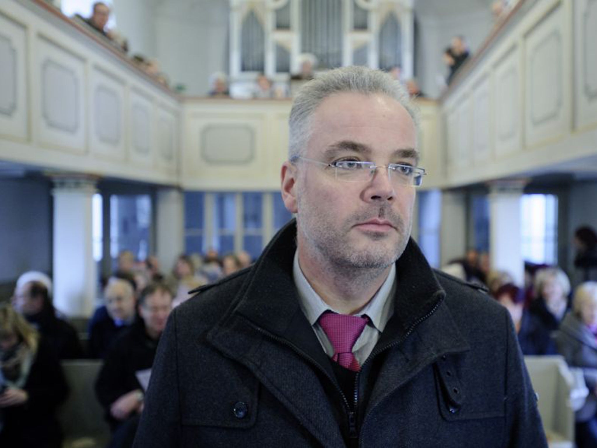 Markus Nierth, who resigned as mayor of Tröglitz, says he is ‘stunned’ at the apparent arson