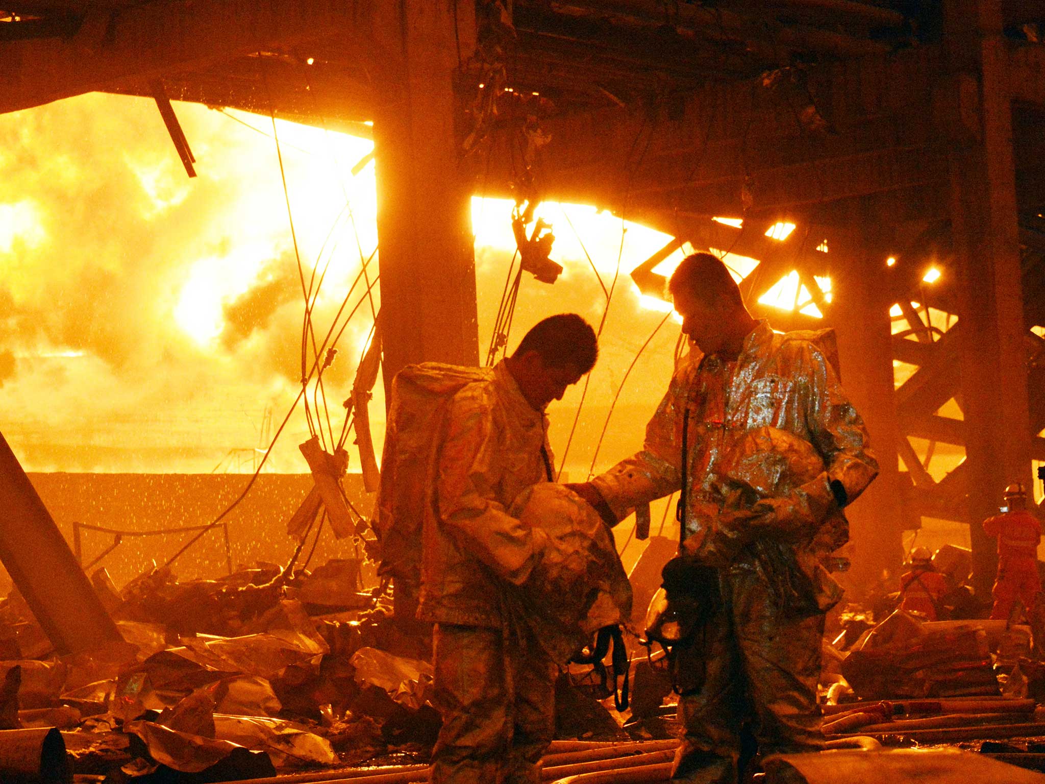 Four firefighters have been hospitalised fighting the flames