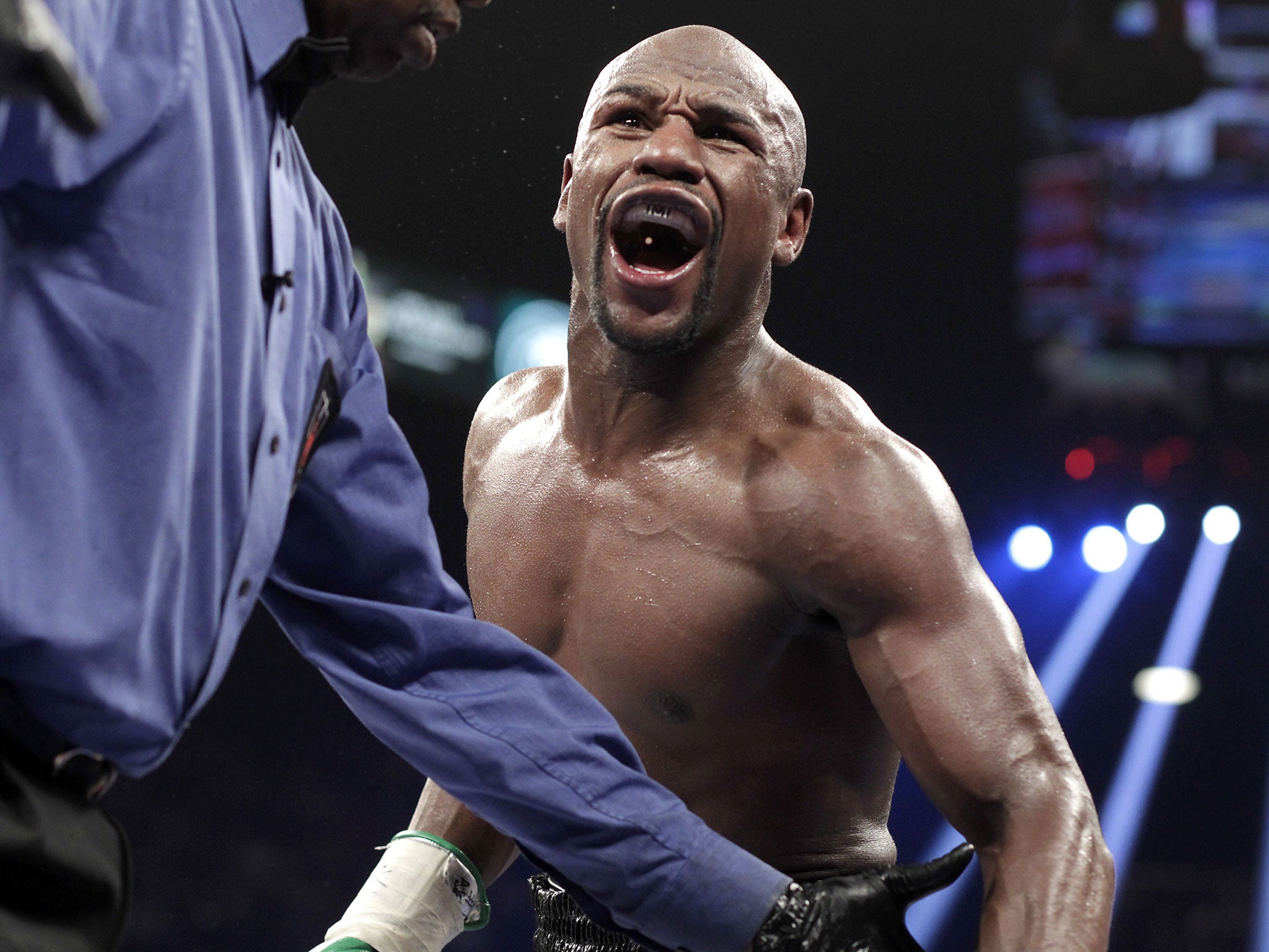 Floyd Mayweather will wear a $25,000 mouthguard