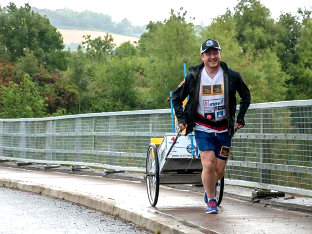 Running man: Kevin Carr, pictured during the early part of his journey