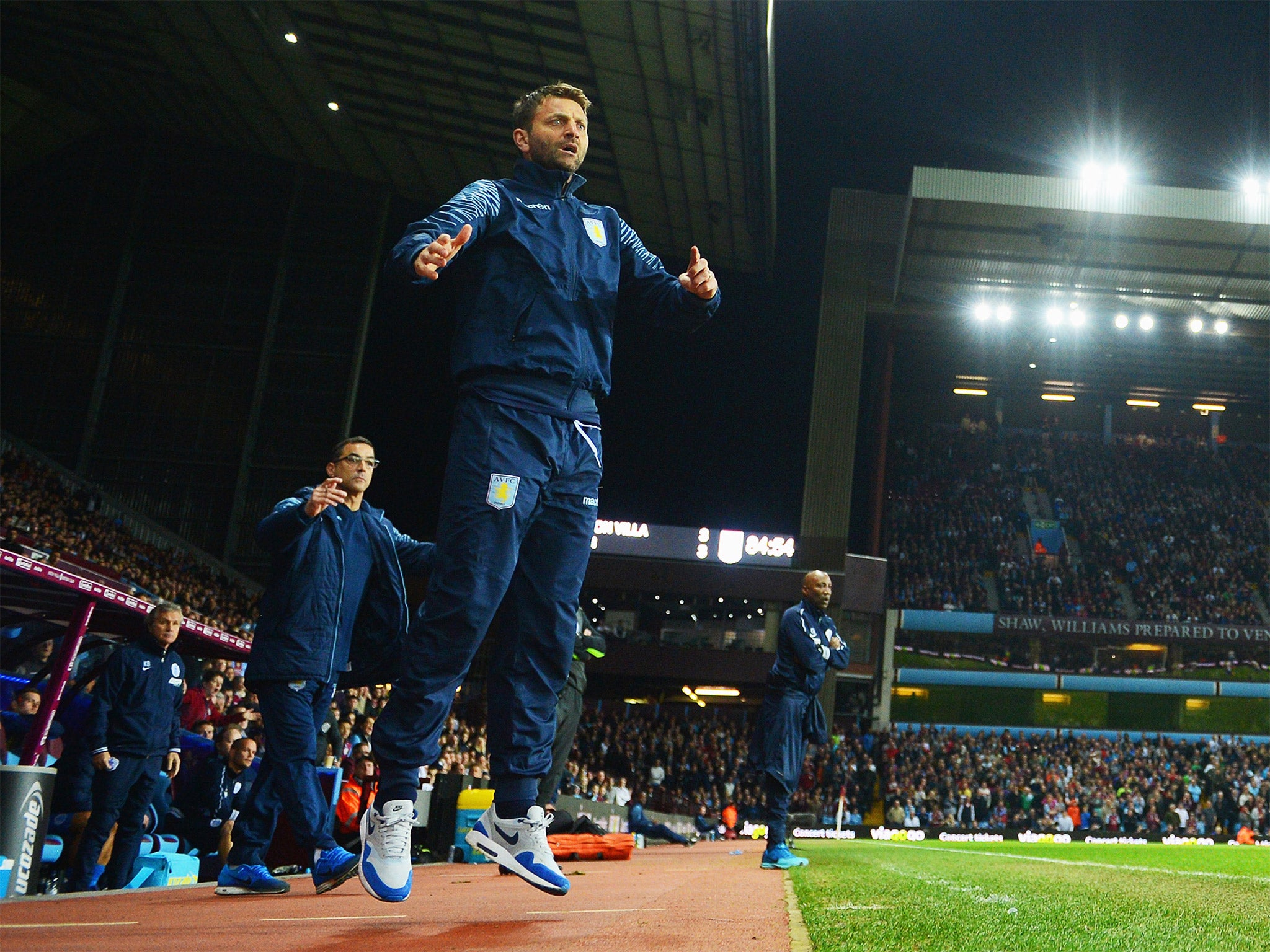 Tim Sherwood goes airborne as he endures the drama from the sideline (Getty)