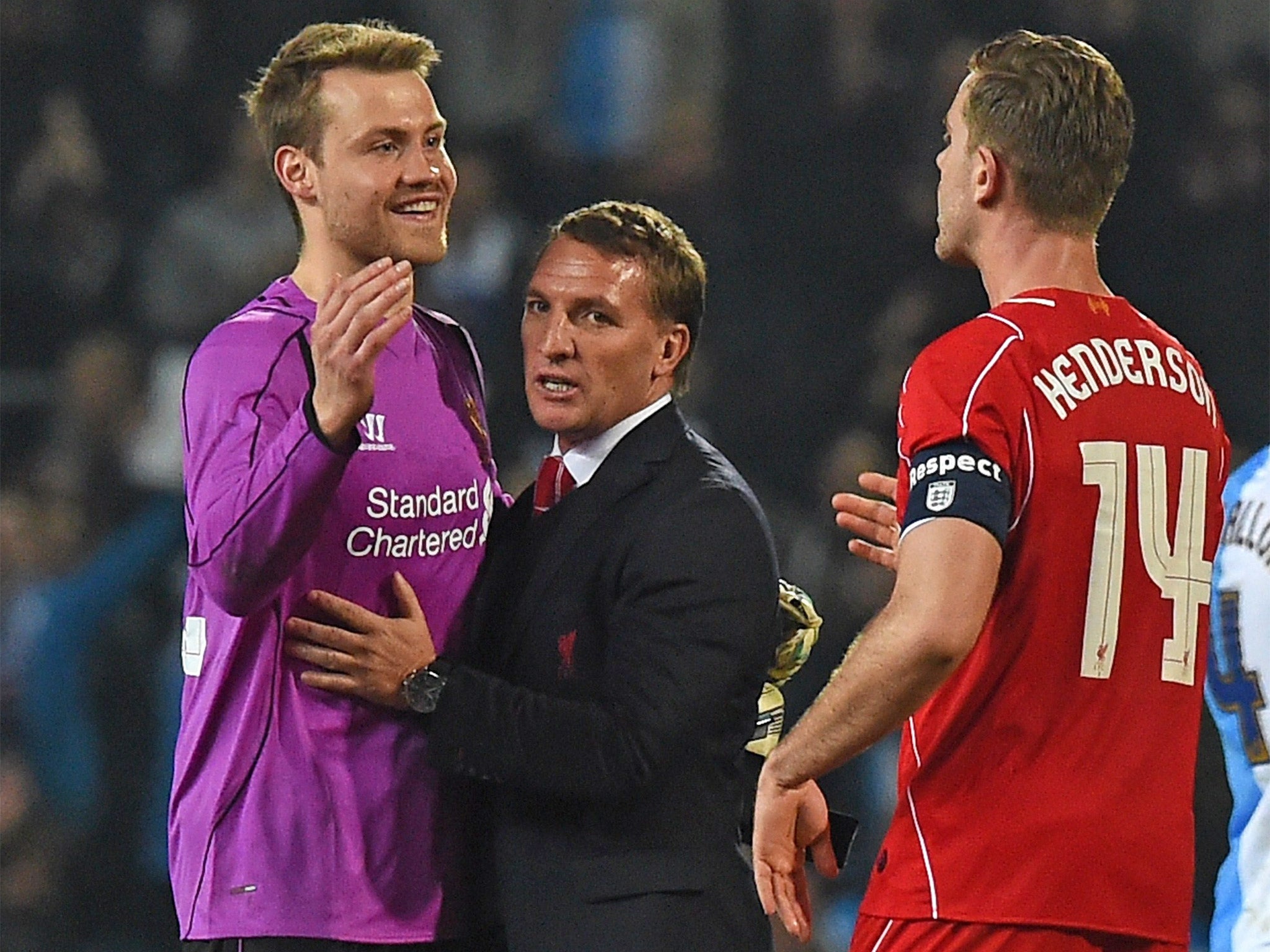 Brendan Rodgers congratulates his players after the game (Getty)