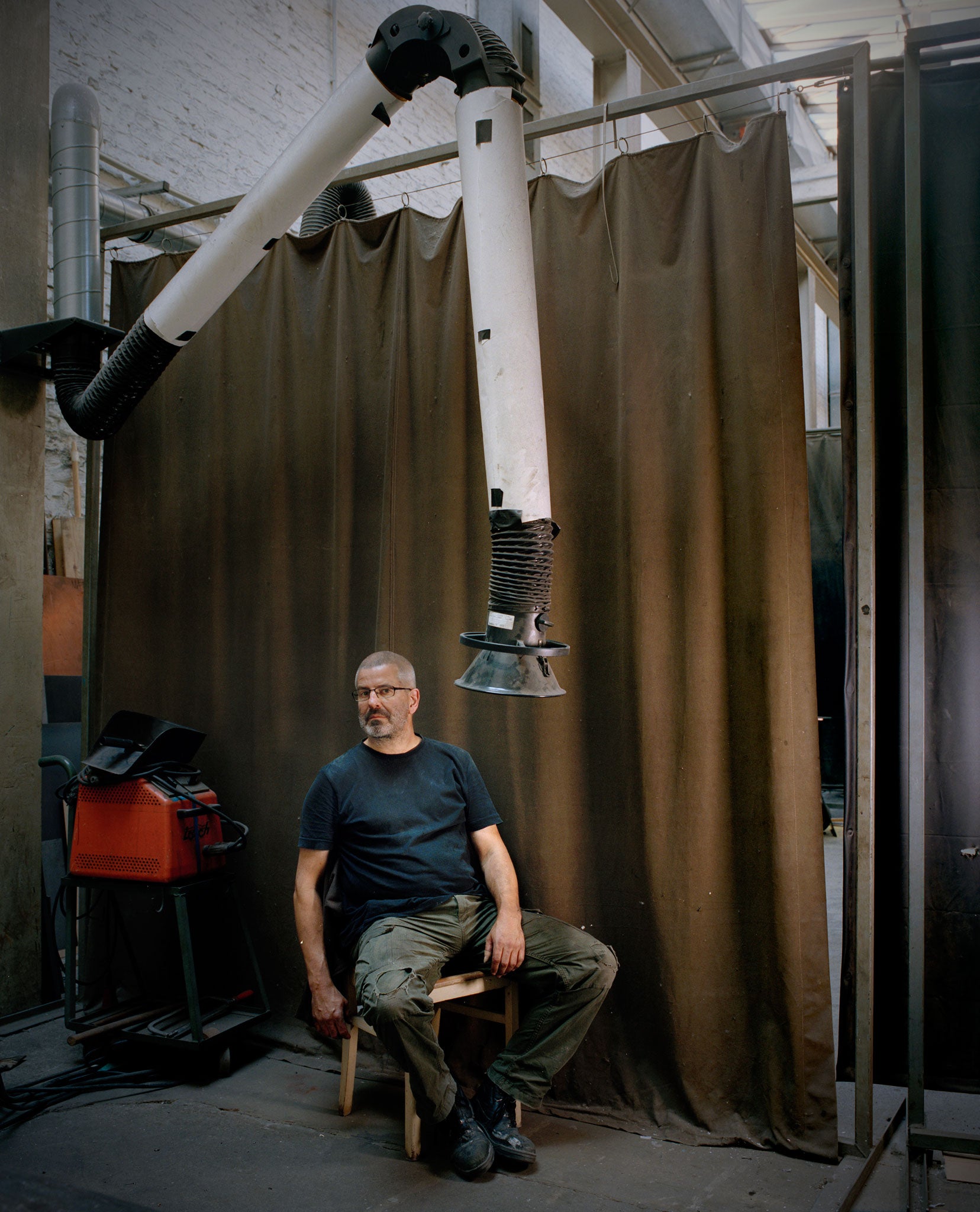 Thomas Rentmeister takes a break from work, in east Berlin