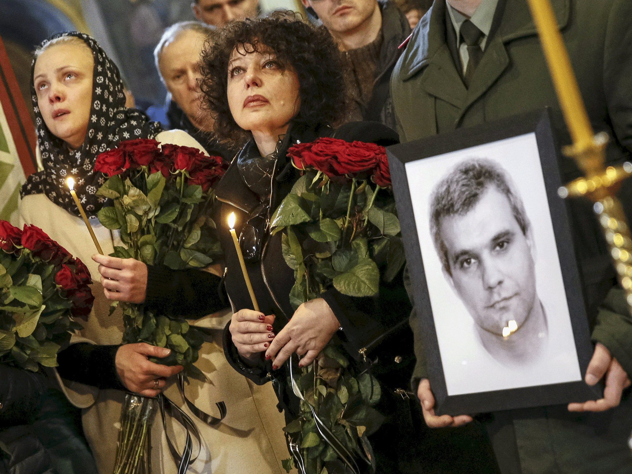 People attend the funeral ceremony of Ukrainian serviceman Ihor Branovytsky