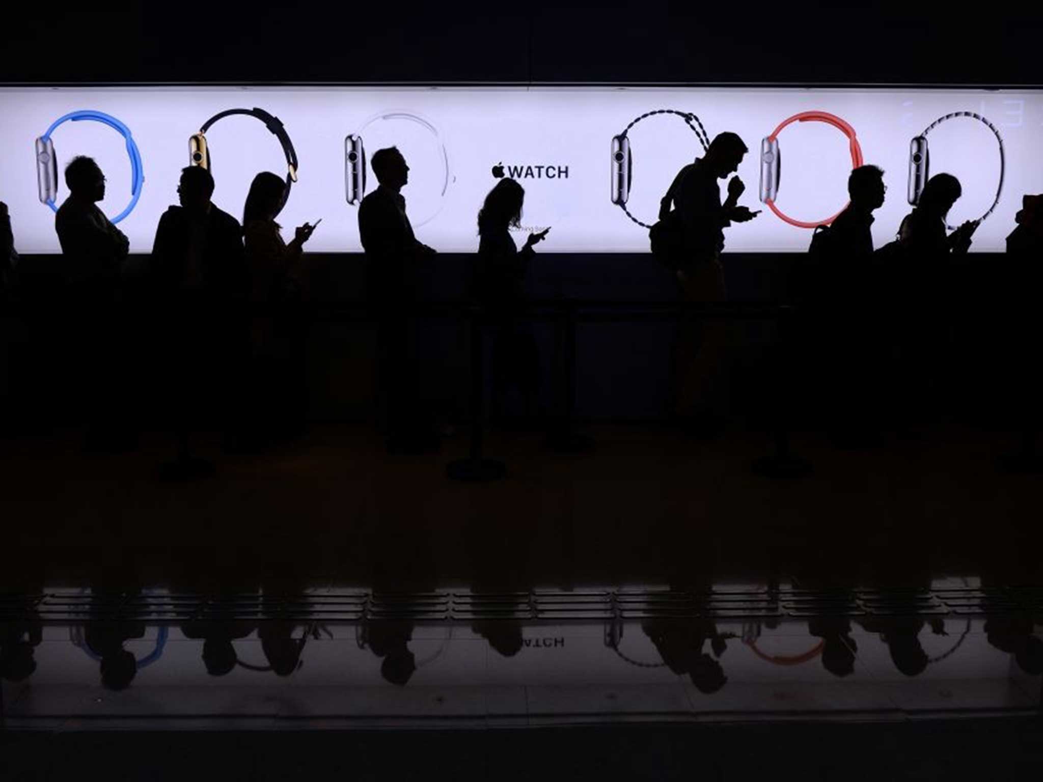 A solution in search of a problem: shoppers queue in Hong Kong to test the Apple Watch, which does little that isn’t already available