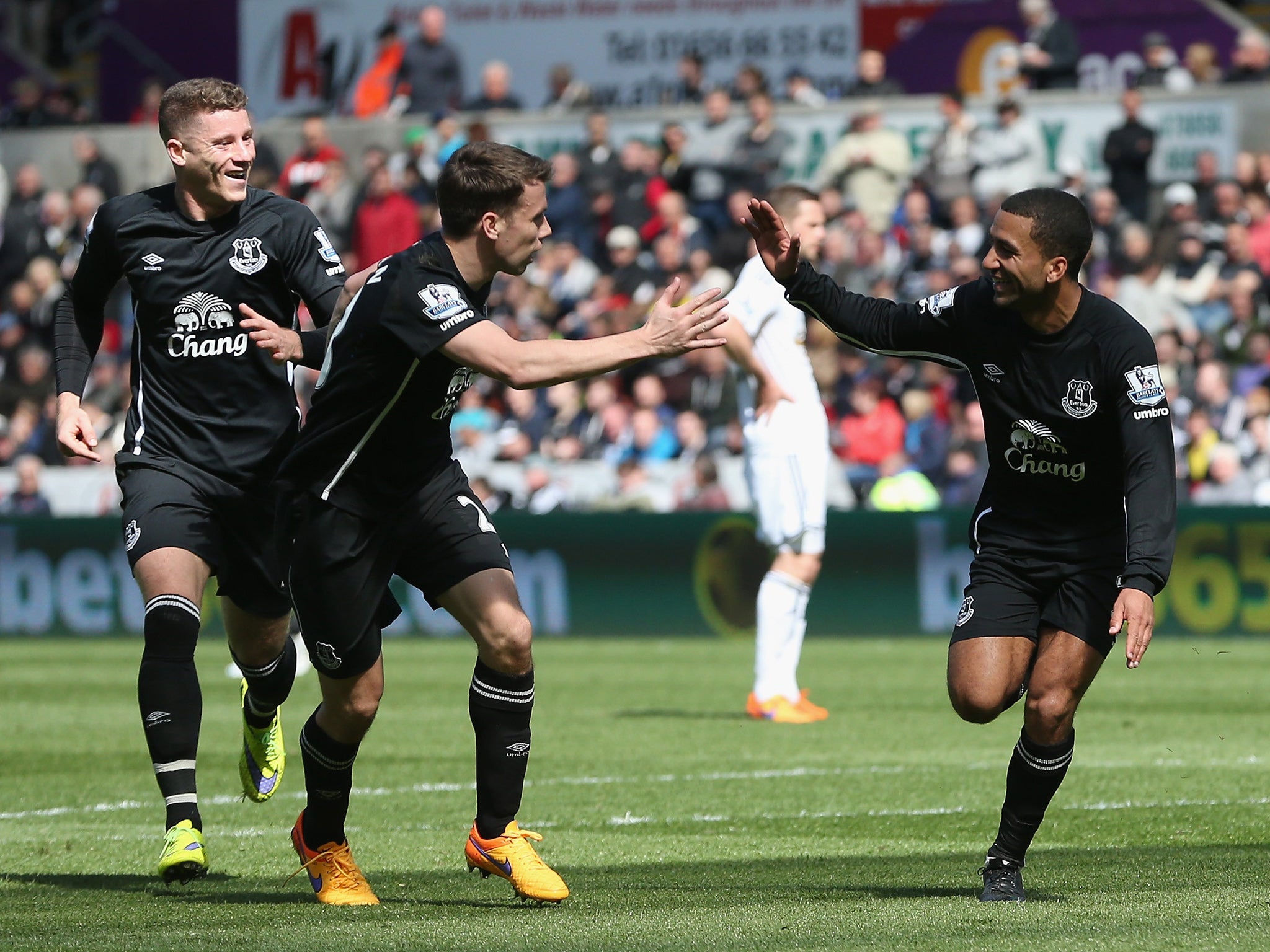 Lennon celebrates his goal just before half-time