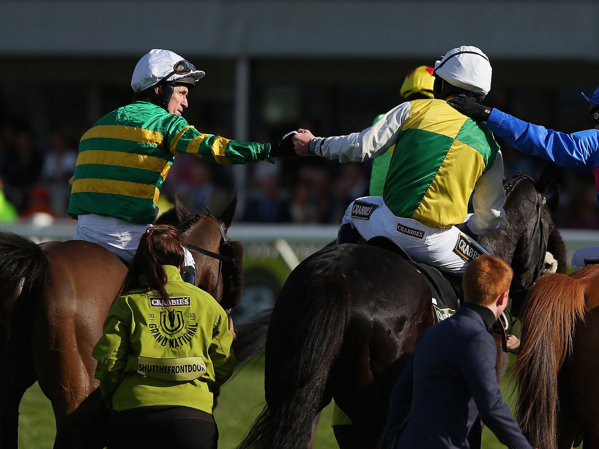 AP McCoy congratulates Leighton Aspell on his Grand National victory