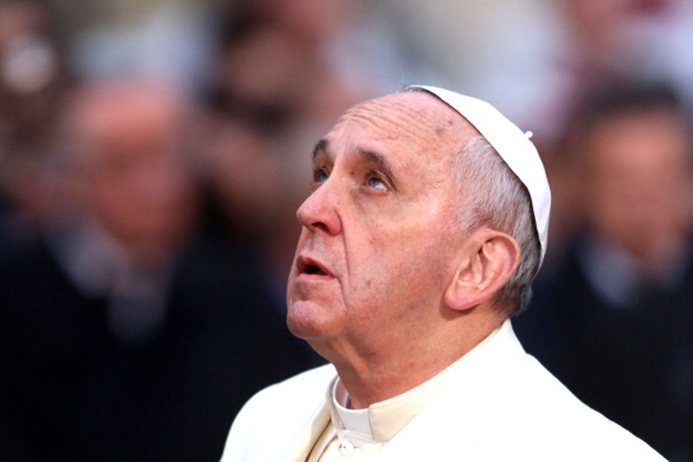 Pope Francis prays in front of the statue of the Immaculate Conception, Rome