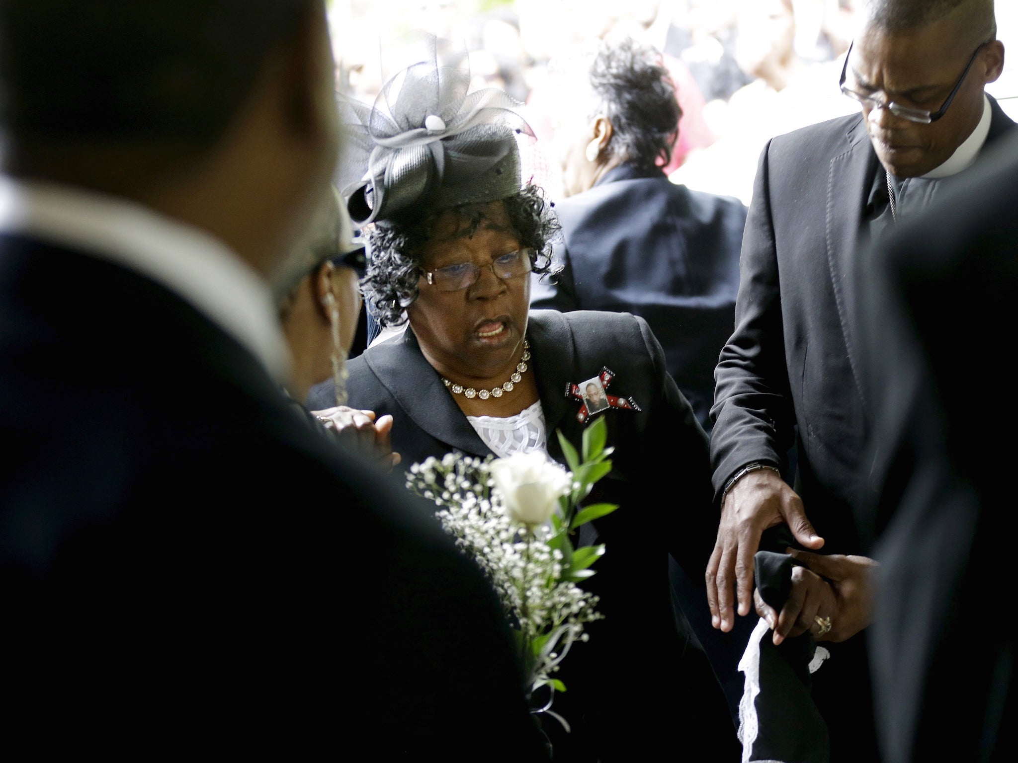 Judy Scott was among mourners paying their last respects to her son, Walter Scott