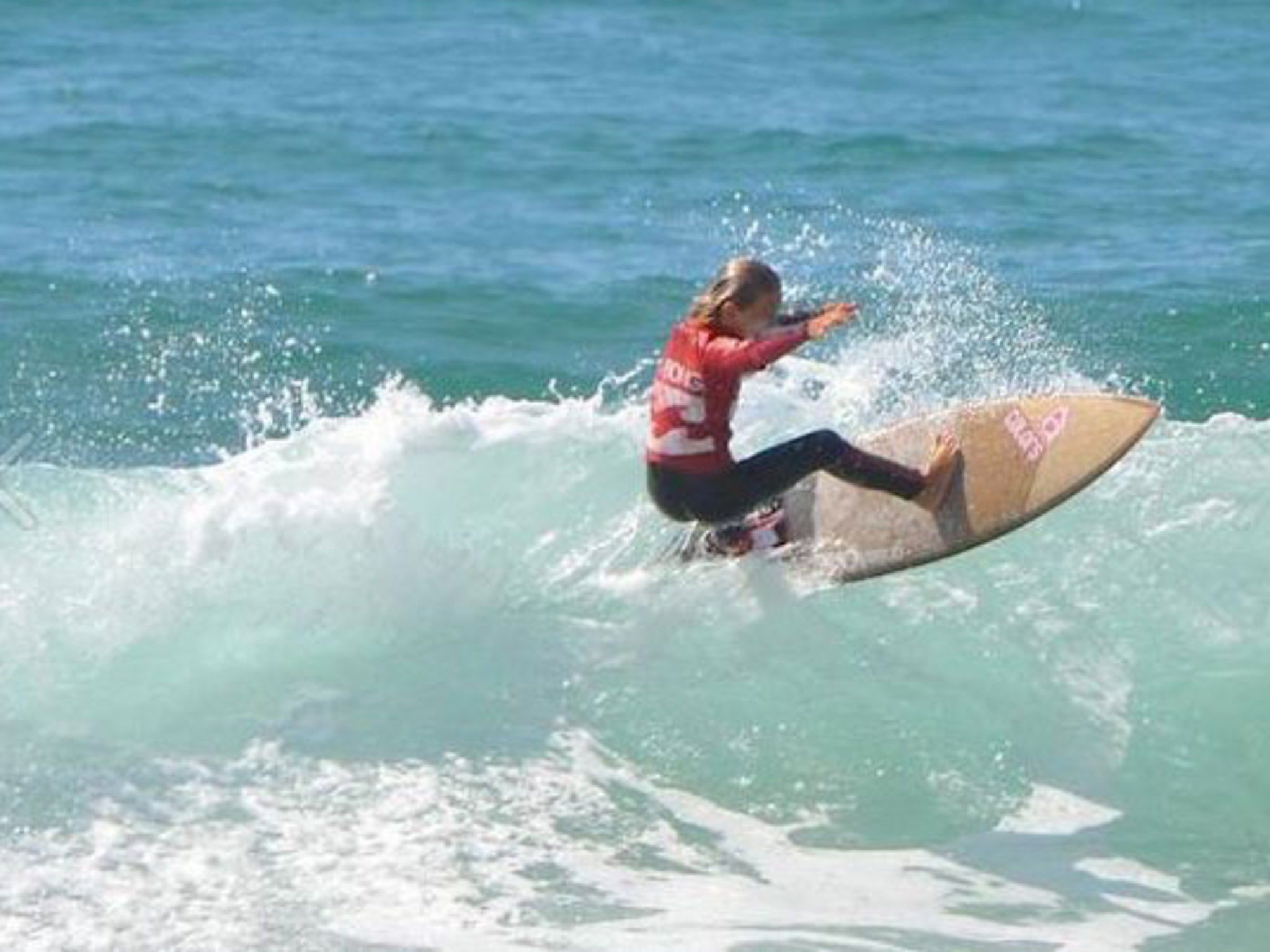 Young surfers gather to mourn the death of 13-year-old Elio Canestri