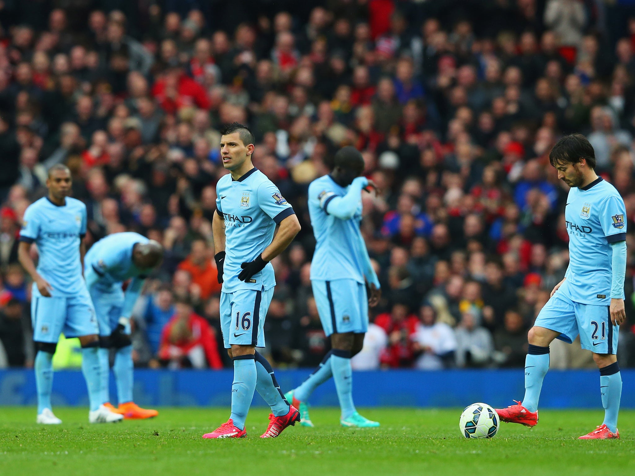 City players react at Old Trafford