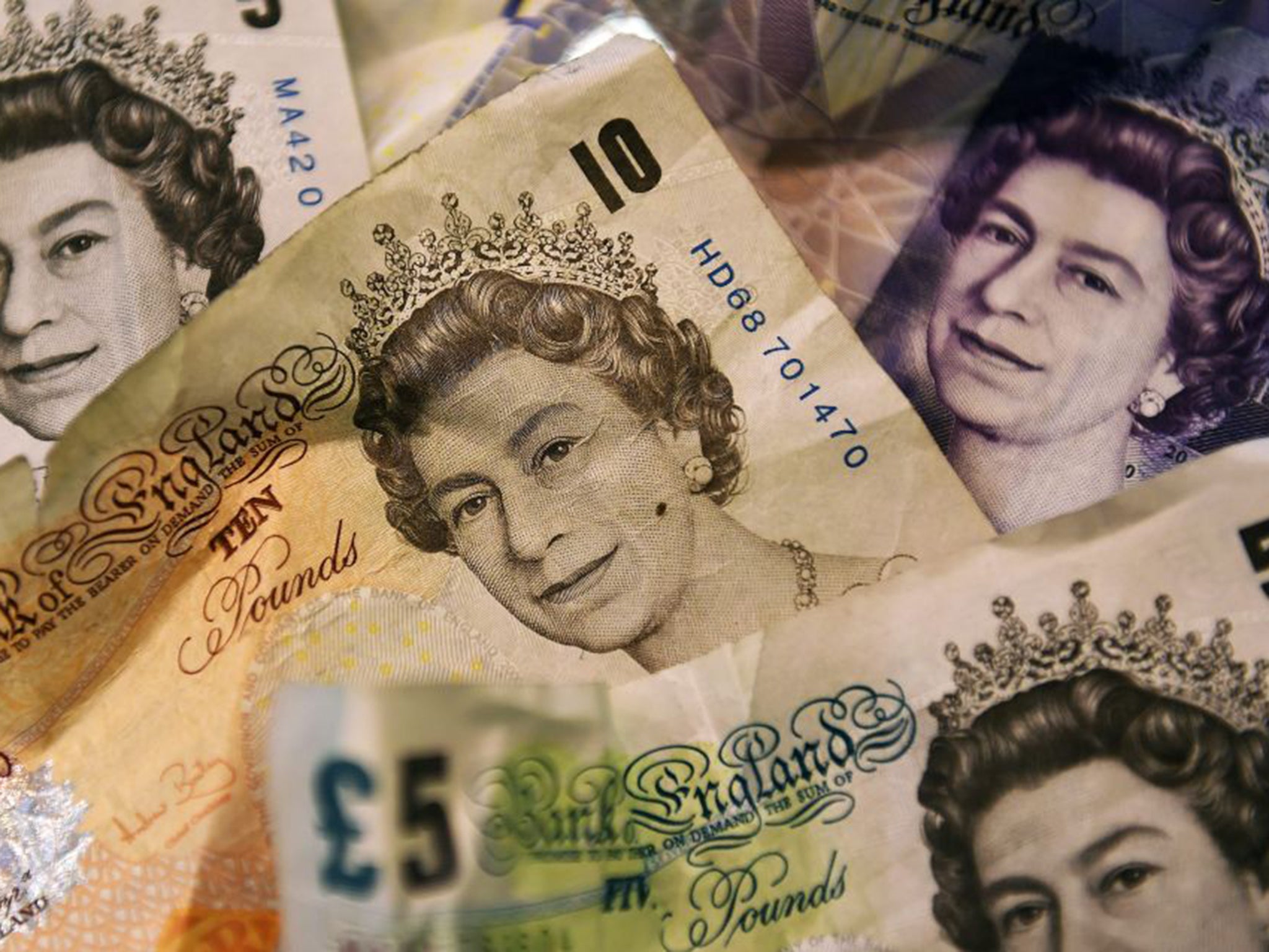 Labour will raise the national minimum wage to more than £8 an hour by October 2019 (EPA)