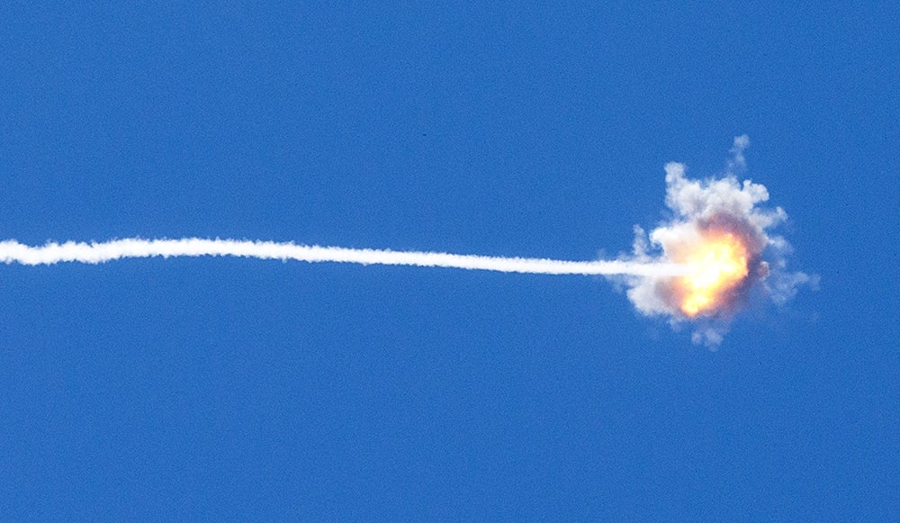 A missile launched by Israel's Iron Dome defence system above the Gaza Strip