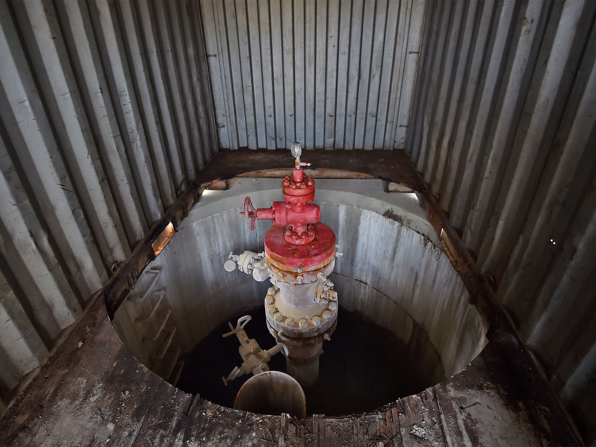 A capped oil well sits in a container at Horse Hill well, the centre of last week's discovery