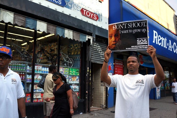 An anti-police violence protest in Crown Heights, Brooklyn, the area where discredited NYPD detective Louis Scarcella claimed Rosean Hargraves committed murder