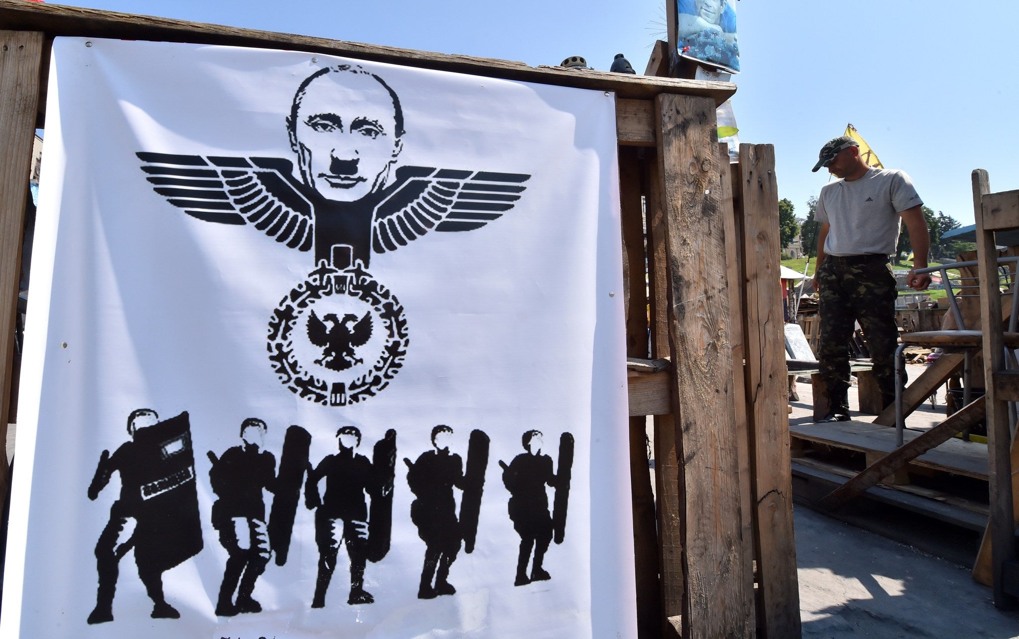 A banner depicts Putin at a Maidan camp in Independence Square in Kiev, Ukraine. The Night Wolves are opponents of the pro-European Maidan movement