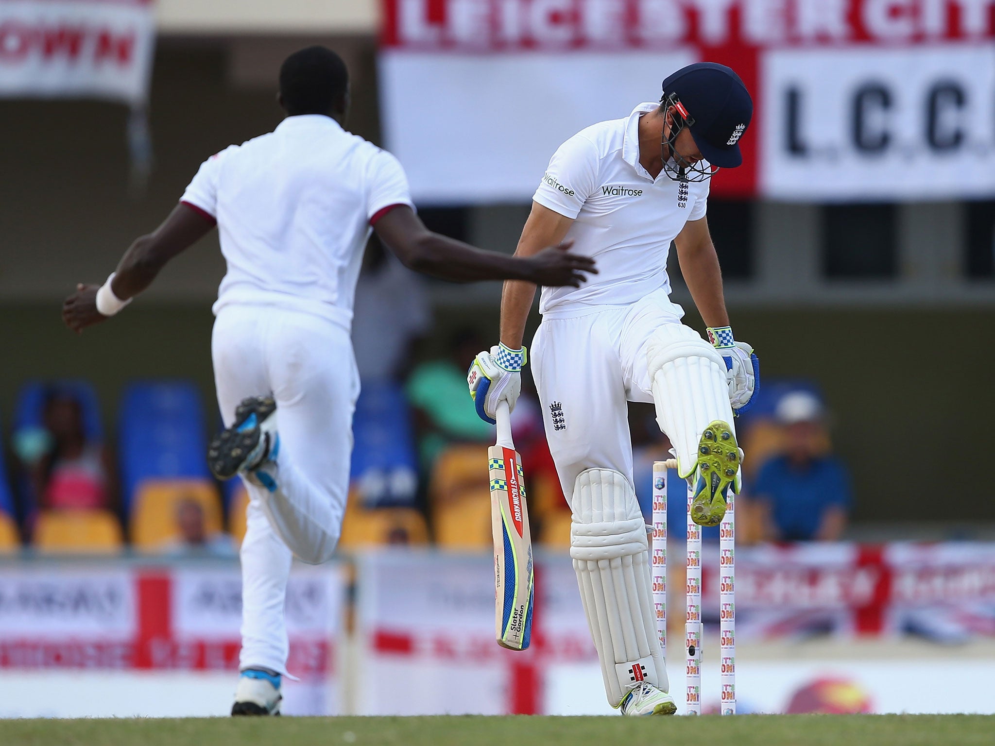 Alastair Cook reacts after being dismissed