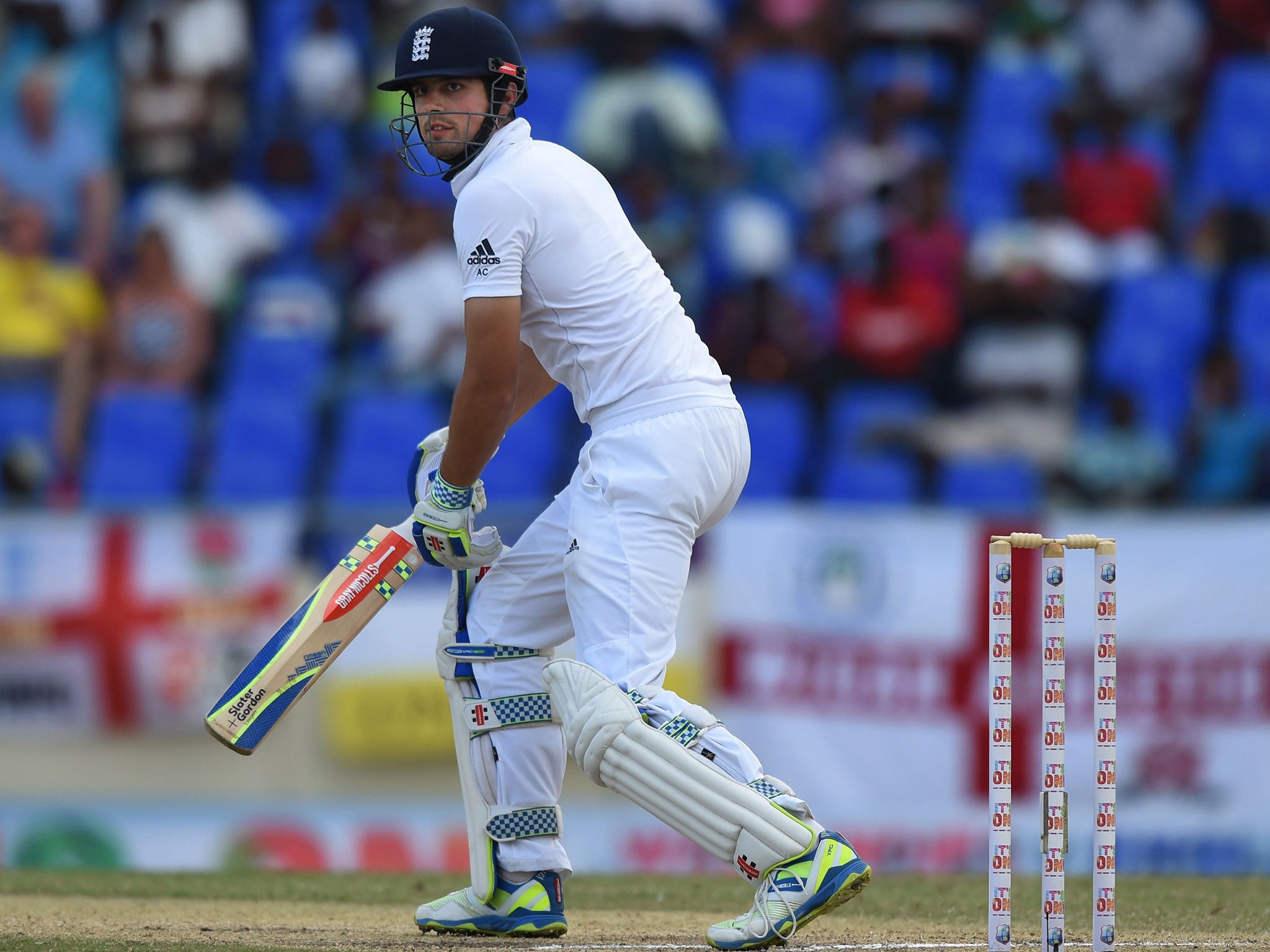 Alastair Cook looks on after being caught for 13