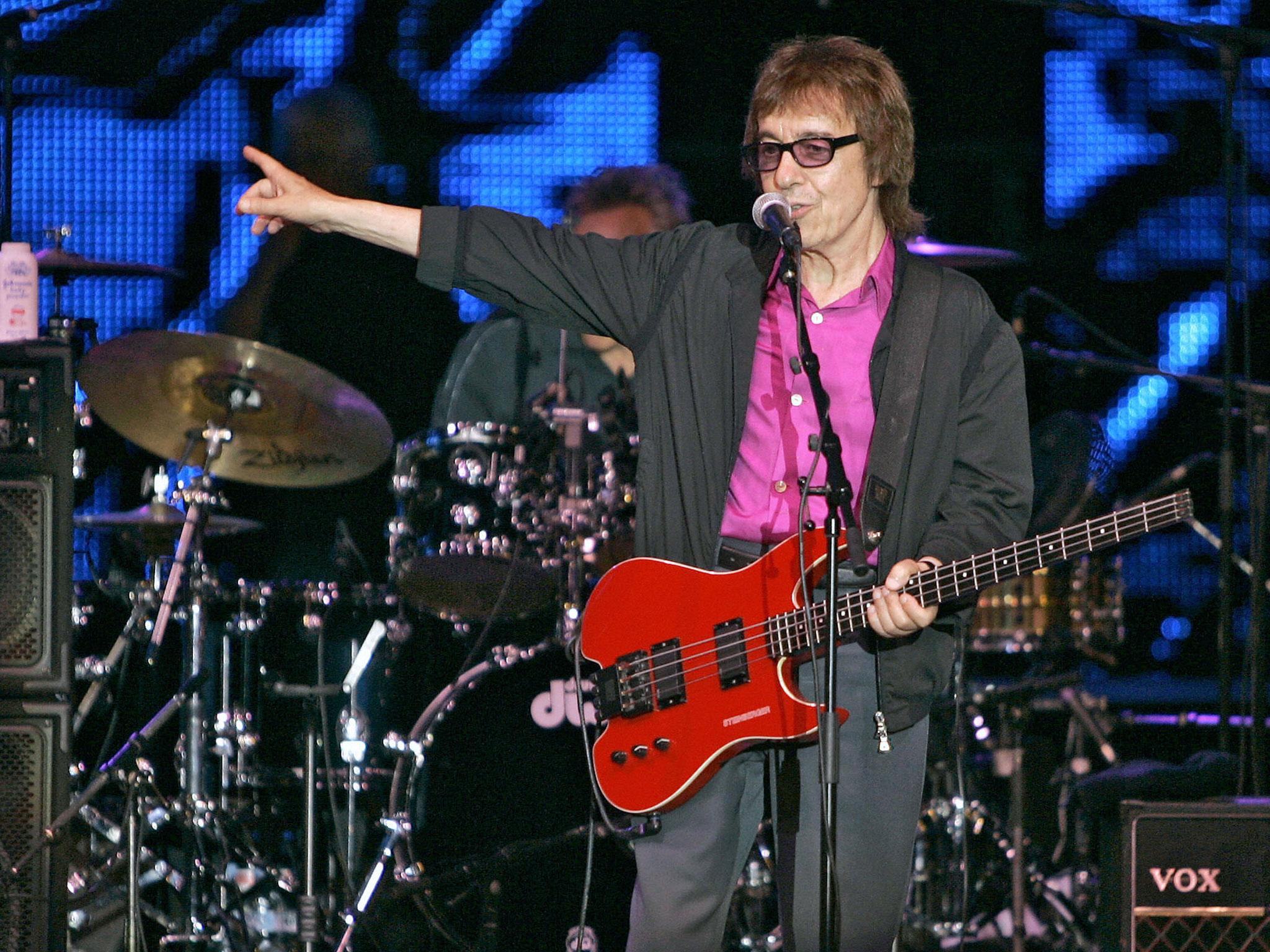 Rolling Stone bass player Bill Wyman performs during a concert for the Red Cross Gala