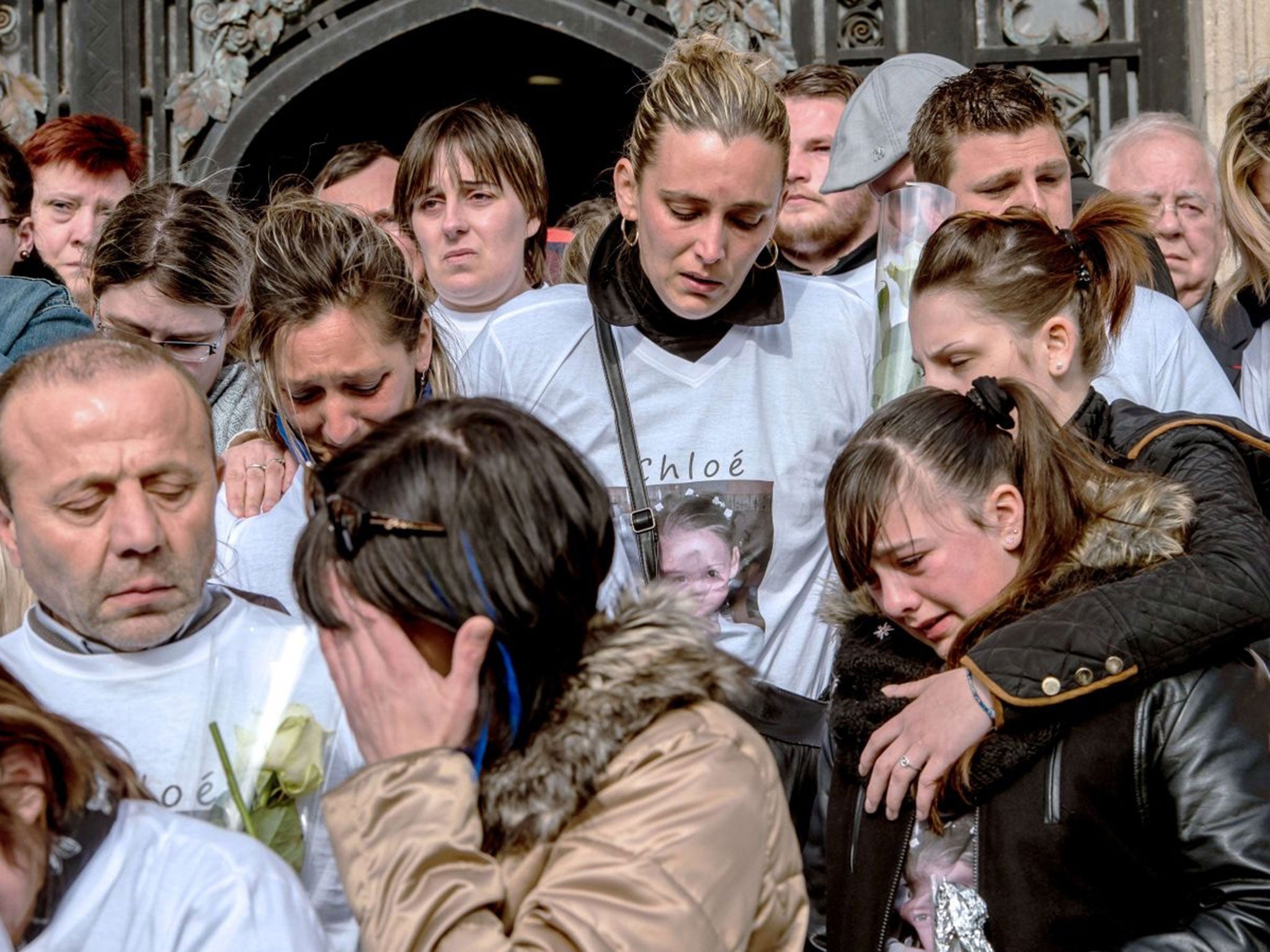 Relatives of Chloe mourn her death (Image: PHILIPPE HUGUEN/AFP)