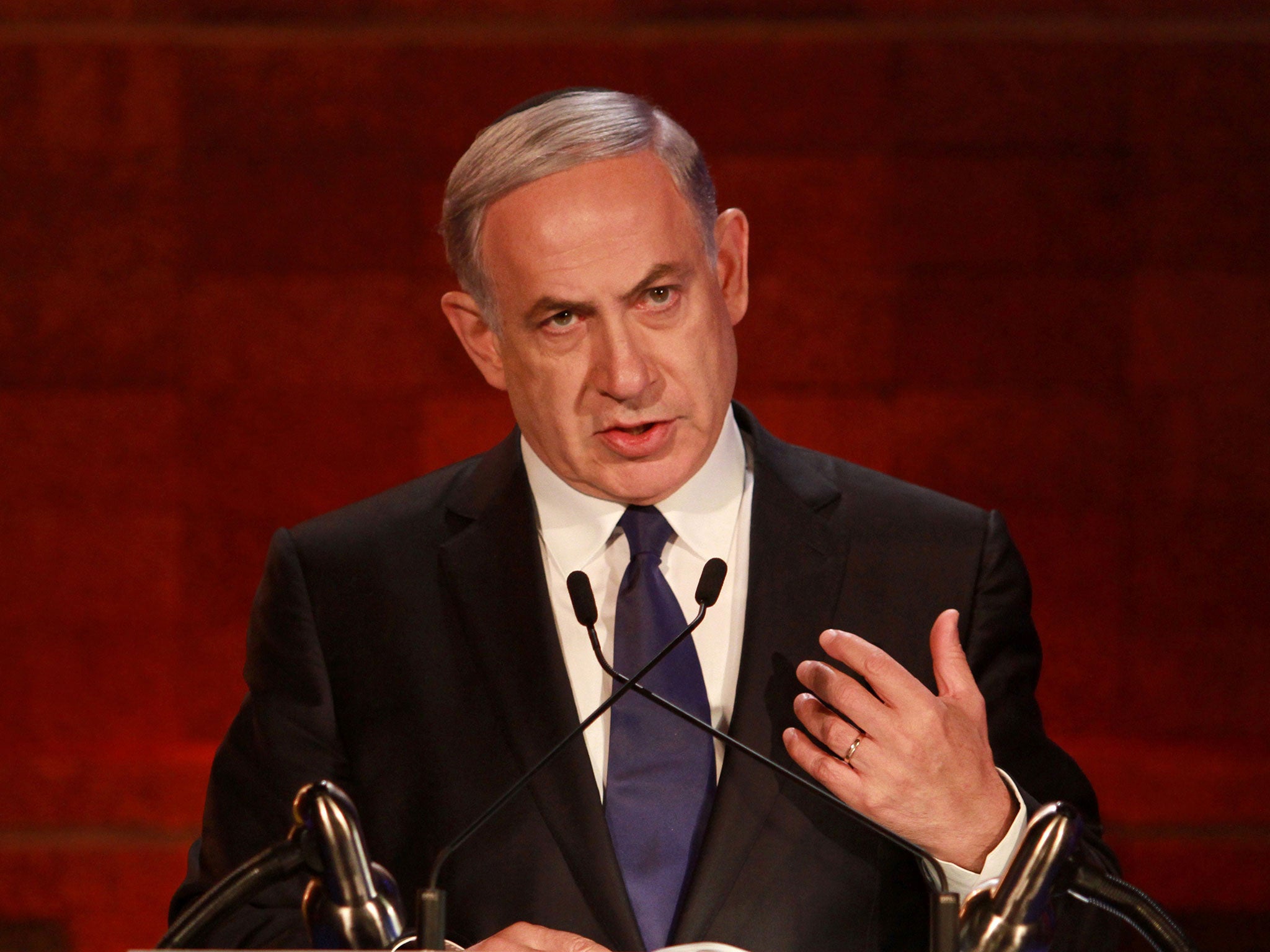 Israeli Prime Minister Benjamin Netanyahu delivers a speech during a ceremony marking the Holocaust Remembrance Day on April 15, 2015 at the Yad Vashem Holocaust memorial in Jerusalem.