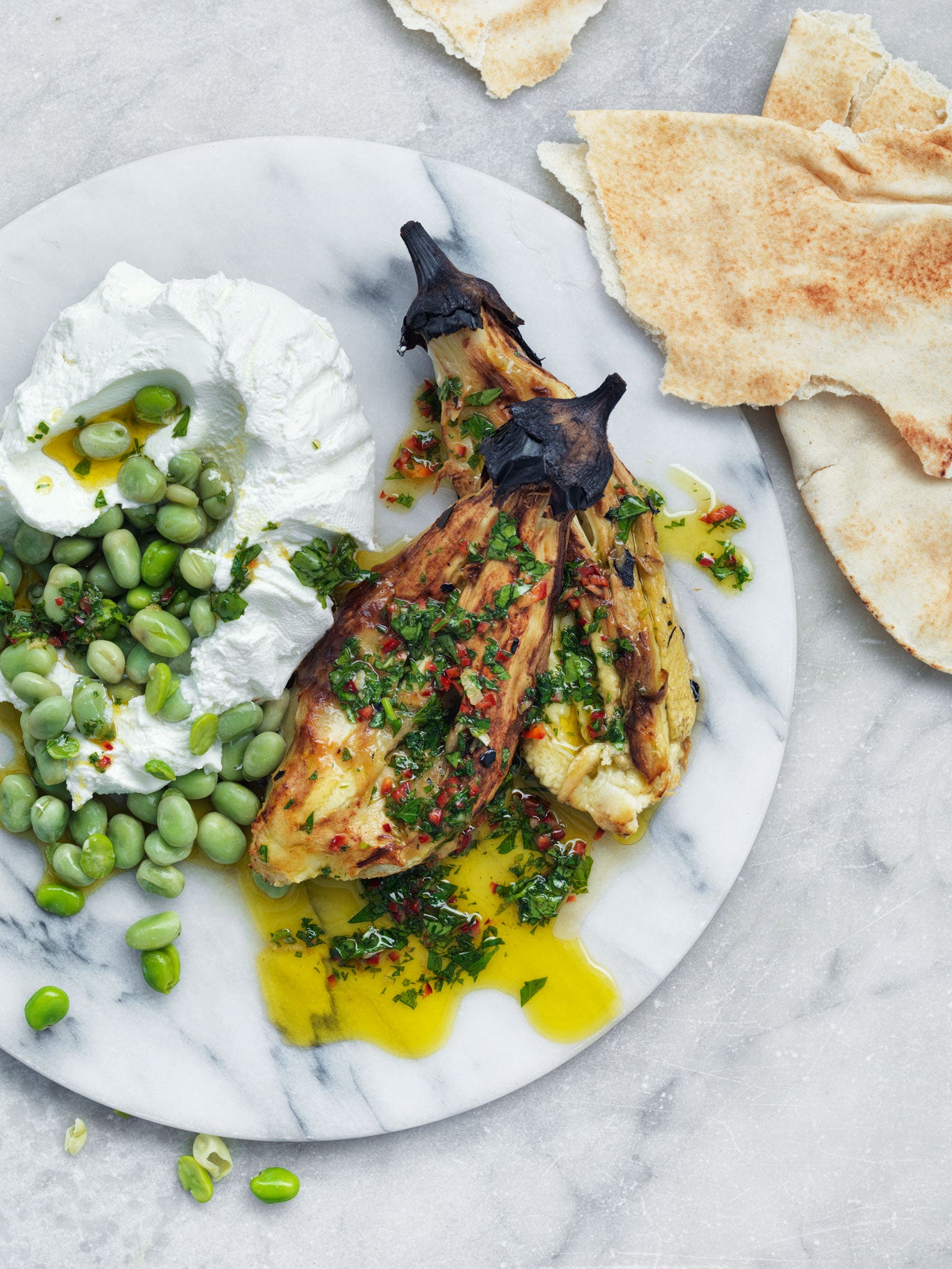 Labne with charred aubergine and broad beans