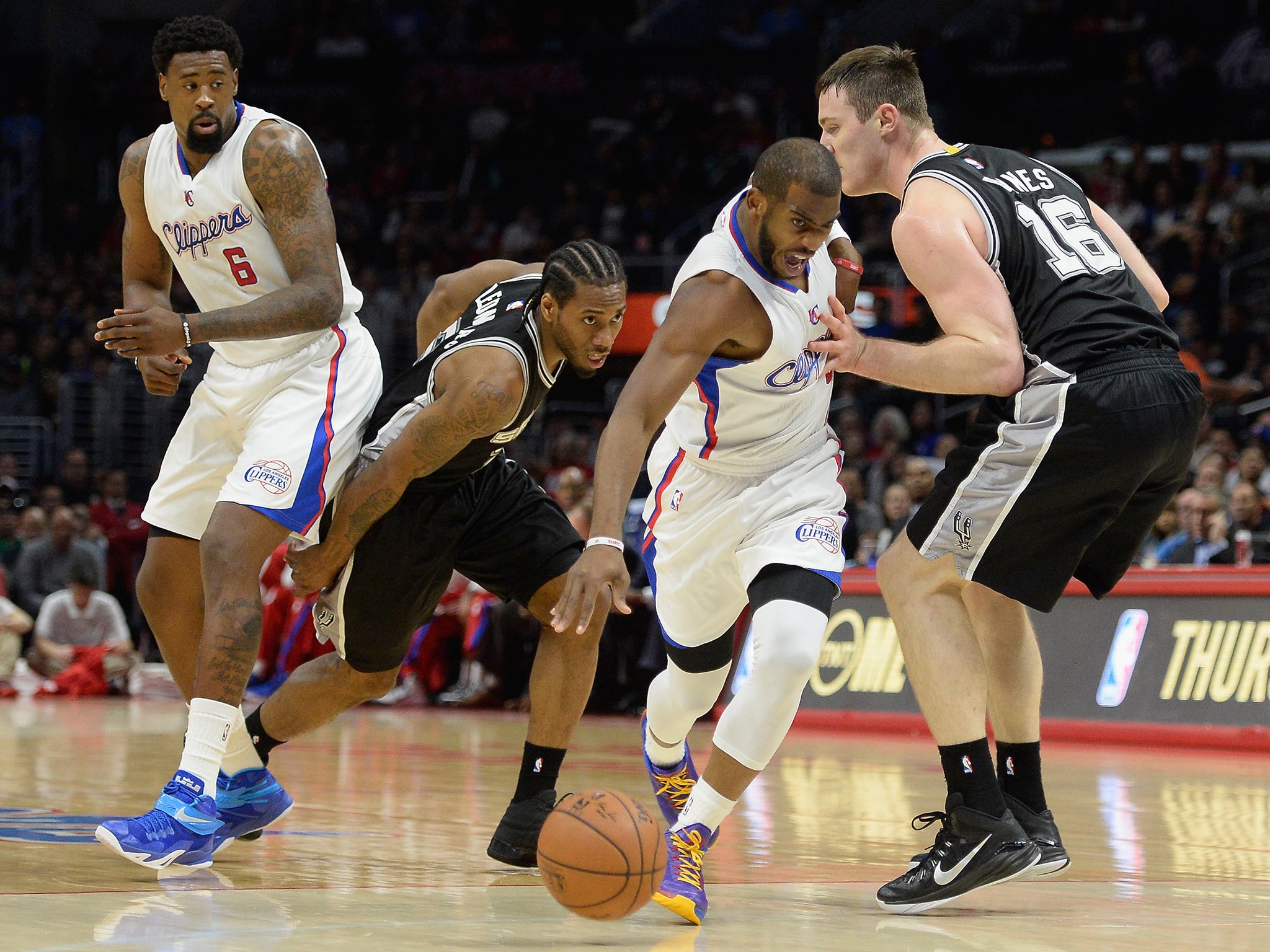 The LA Clippers taking on the defending champion San Antonio Spurs in the tie of the round