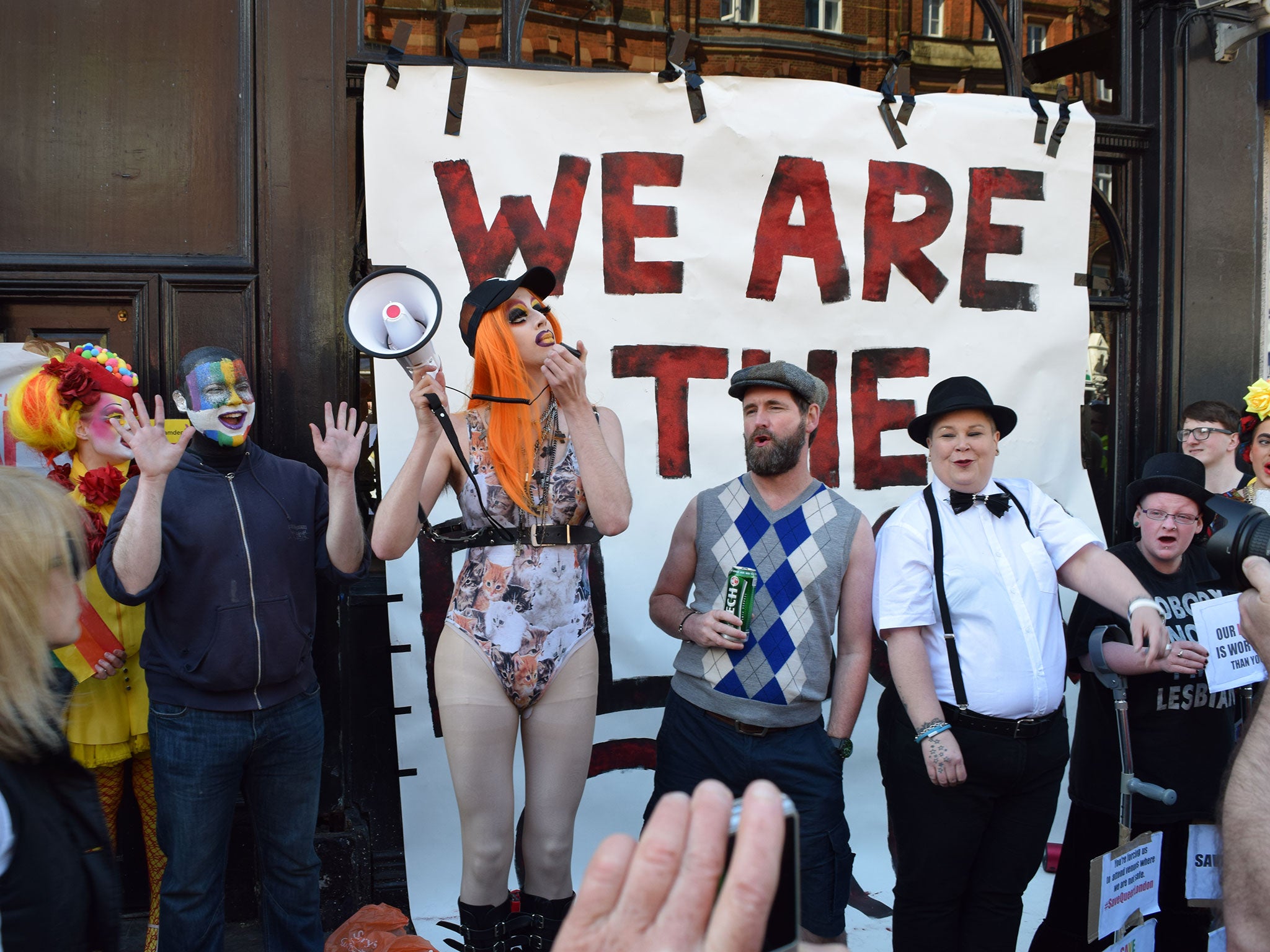 Drag queen Meth addresses the crowd outside The Black Cap