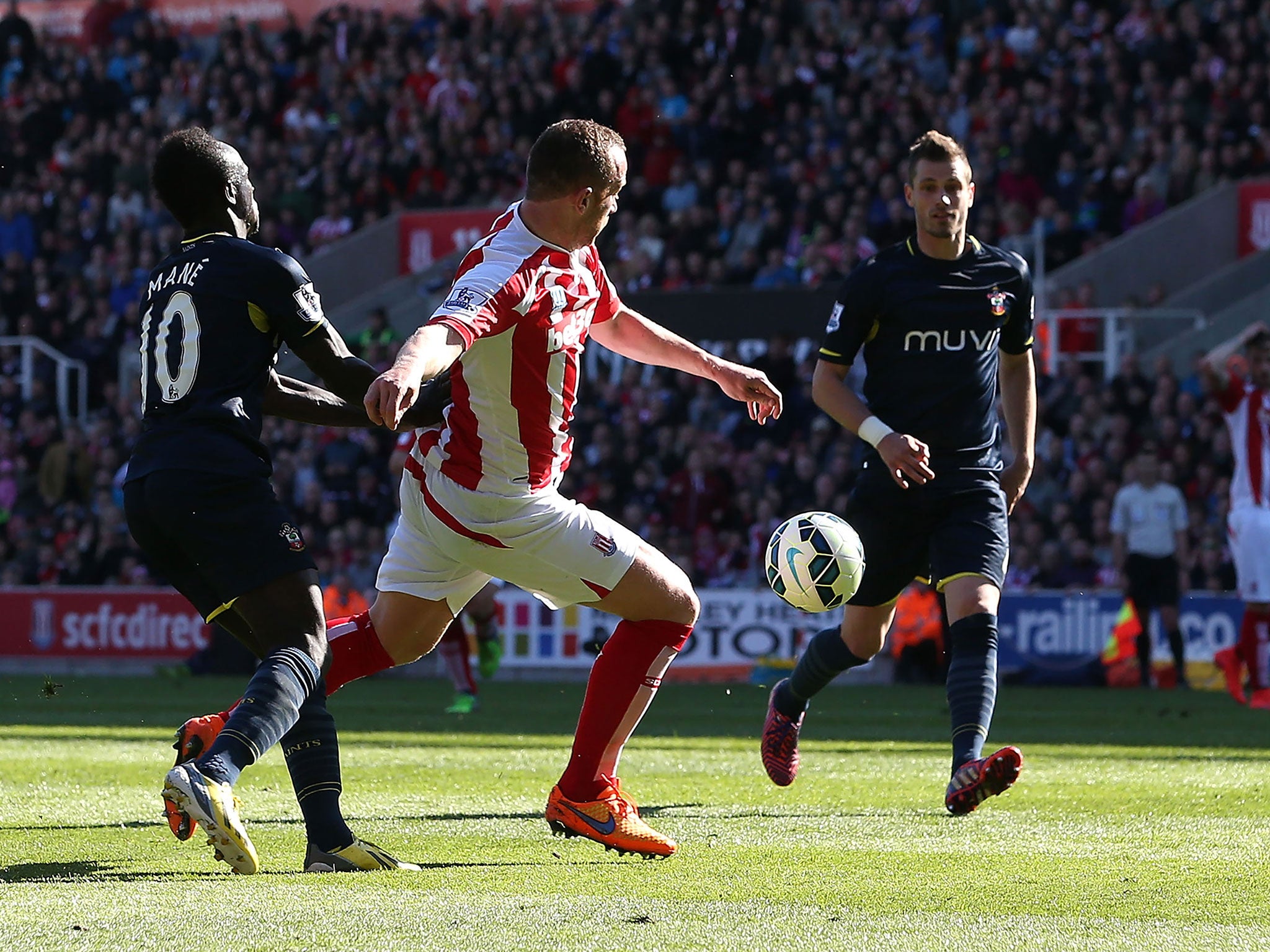 Charlie Adam shoots on the turn to score for Stoke