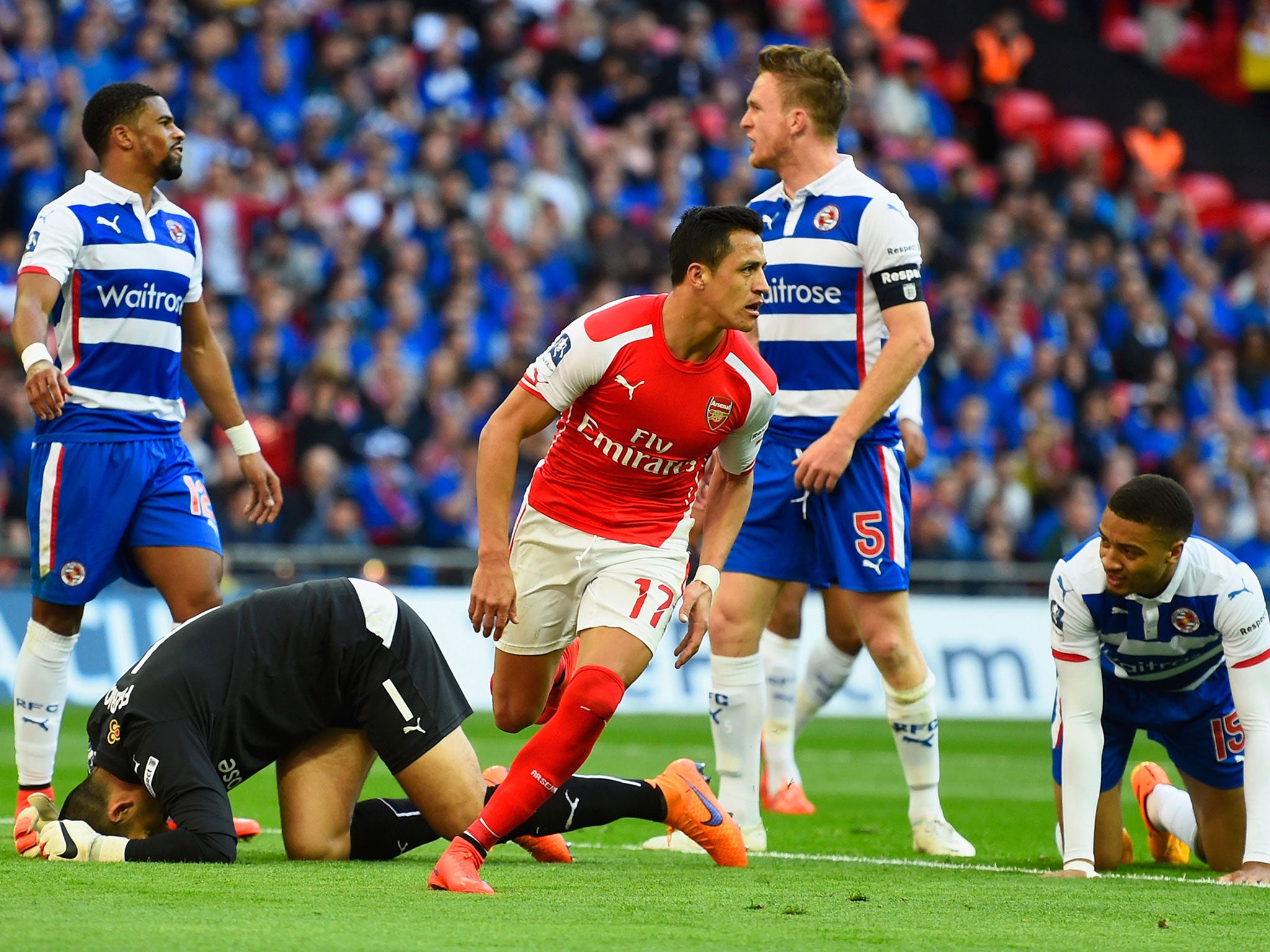 Alexis Sanchez celebrates his first goal