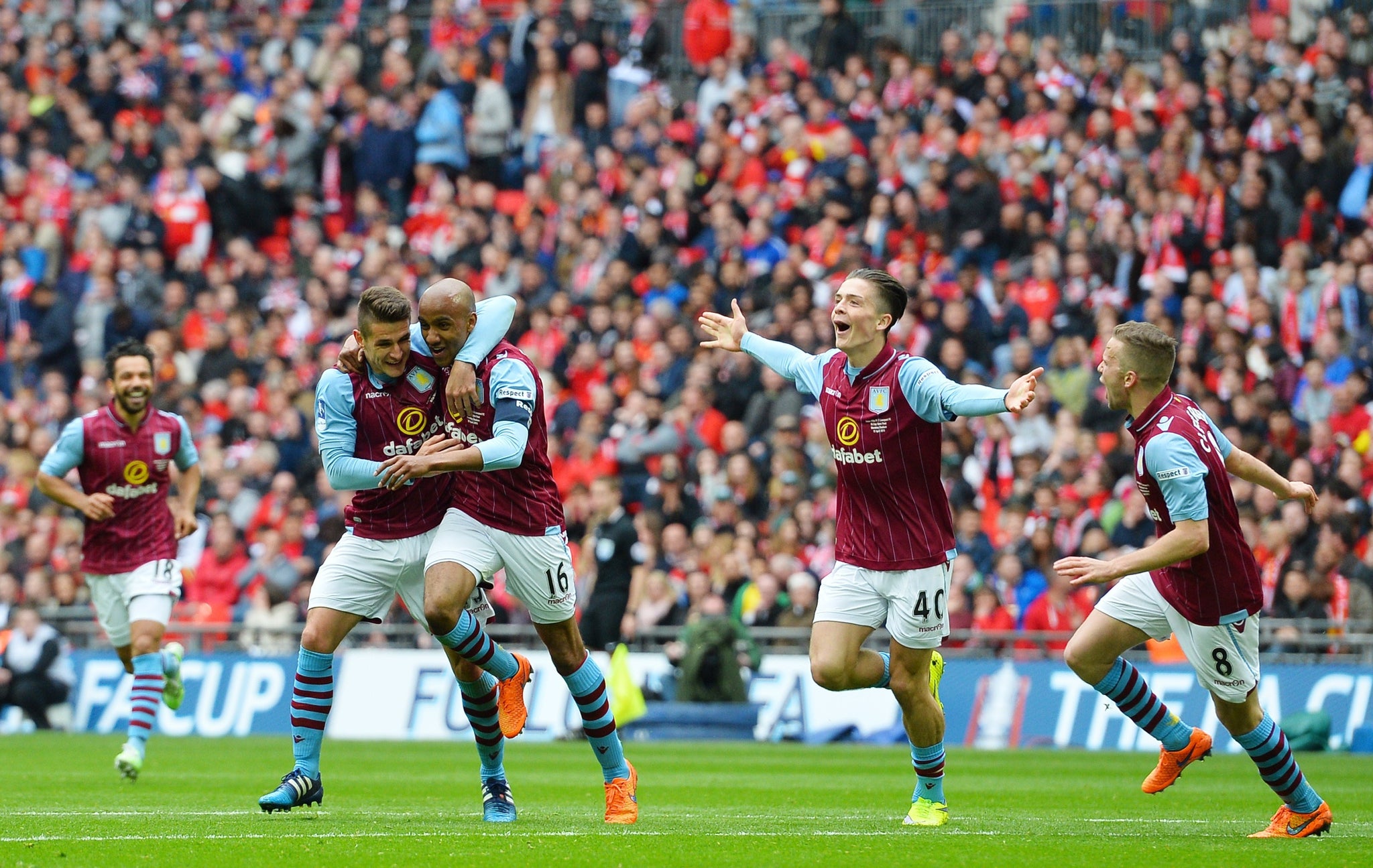 Aston Villa celebrate Fabian Delph's winner