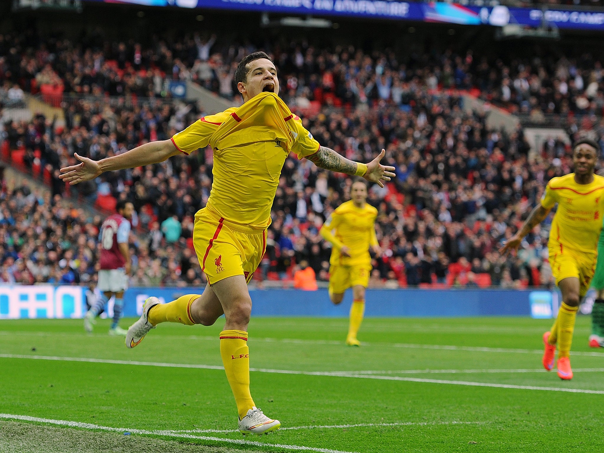 Coutinho celebrates after 'scoring' against Aston Villa