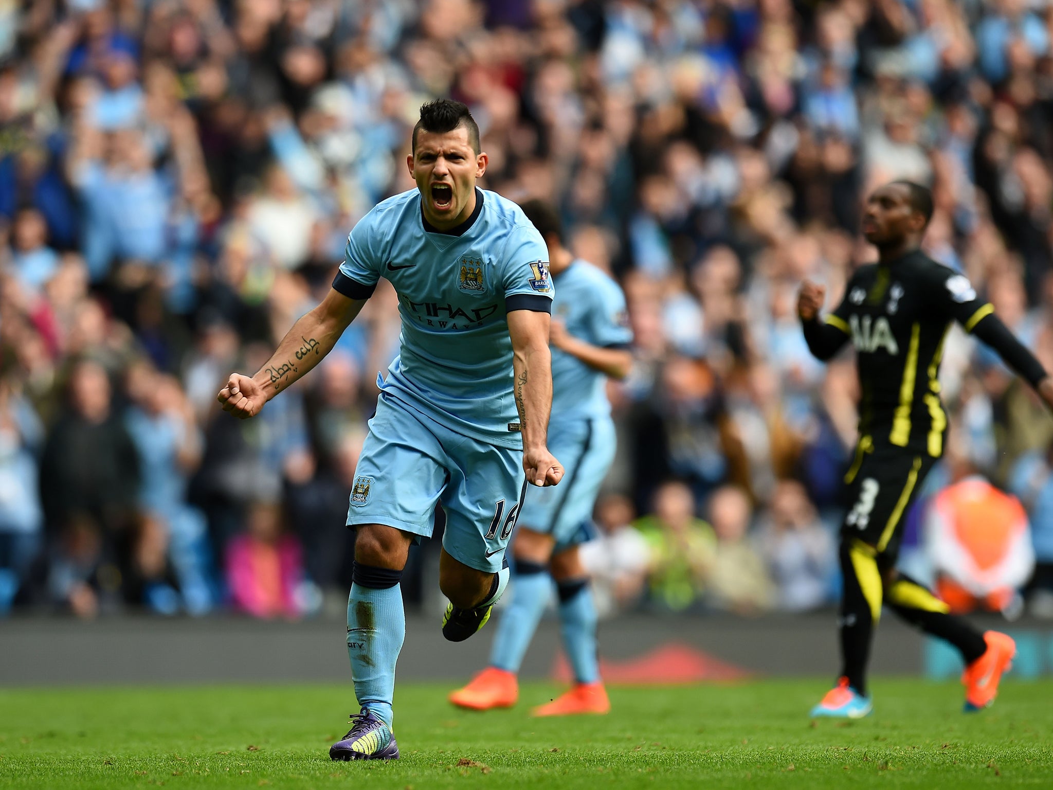 Sergio Aguero celebrates on an afternoon in which he scored four goals against Tottenham