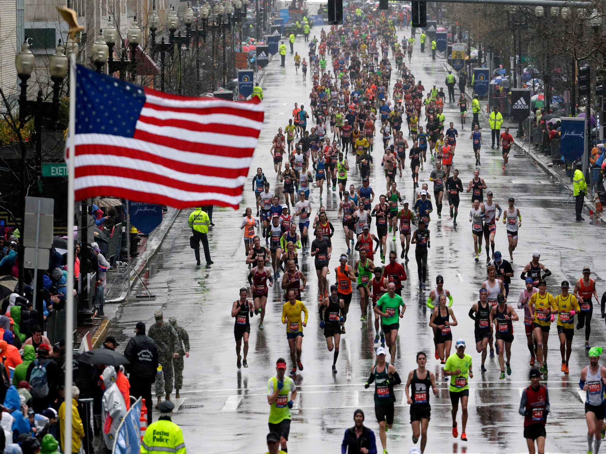 The spontaneous kiss happened during the Boston Marathon