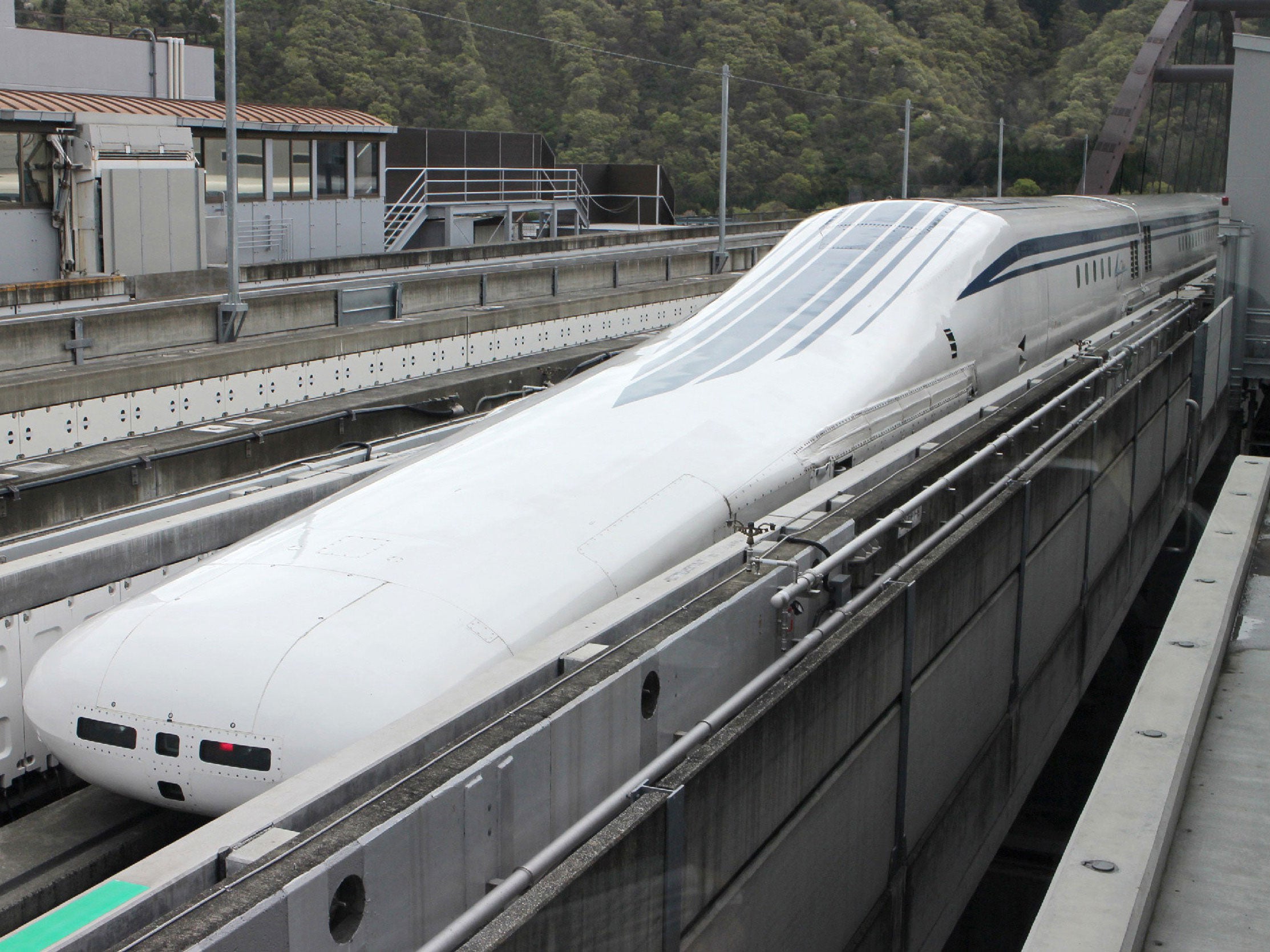 The seven-car maglevtrain returns to the station after setting a new world speed record in a test run near Mount Fuji, clocking more than 600 kilometres (373 miles) an hour