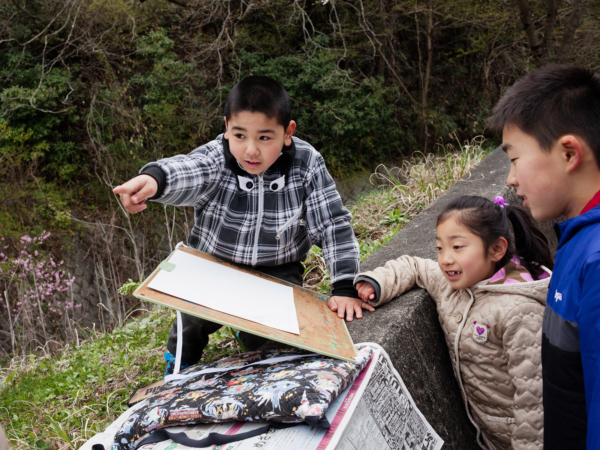 Students sketch a cherry tree during art class (Ko Sasaki/The Washington Post)