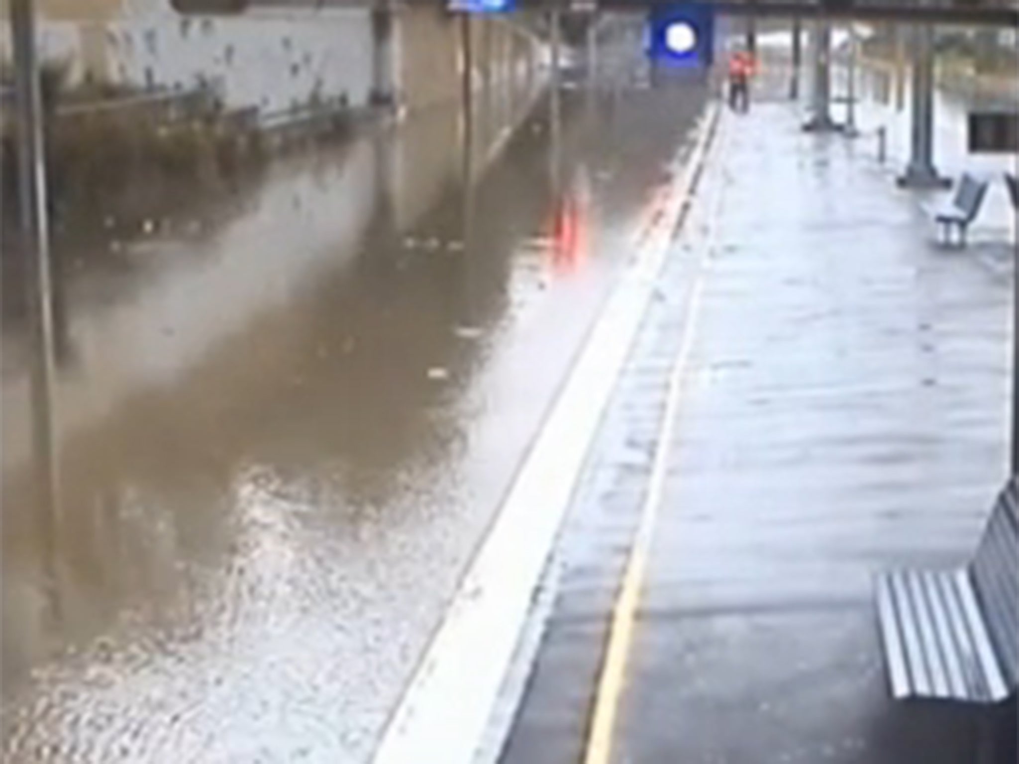 Bardwell Park station is train track is deluged by the flood water