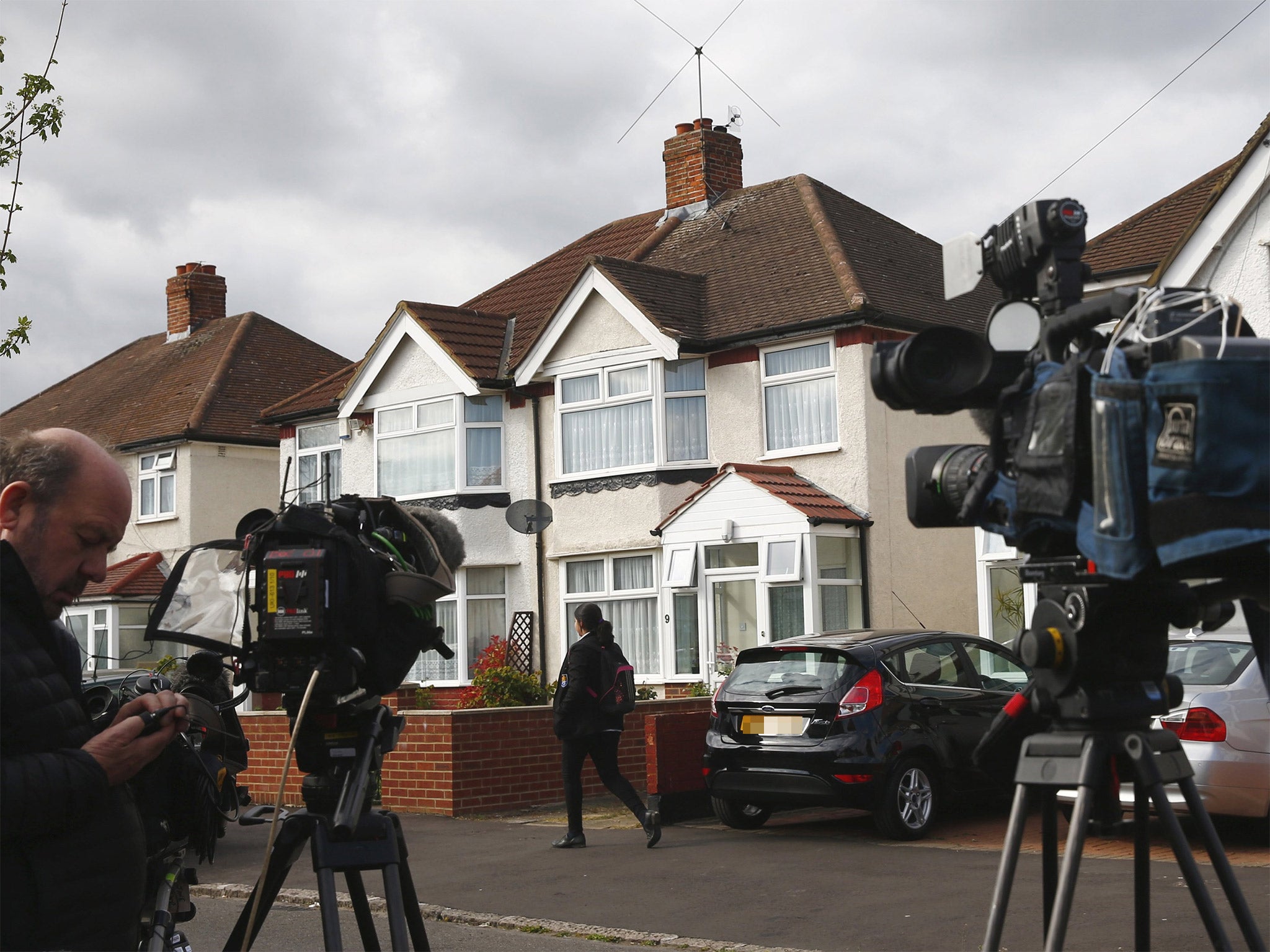 Television crews wait outside the house in Hounslow, west London, where Nav Sarao Futures Limited is registered