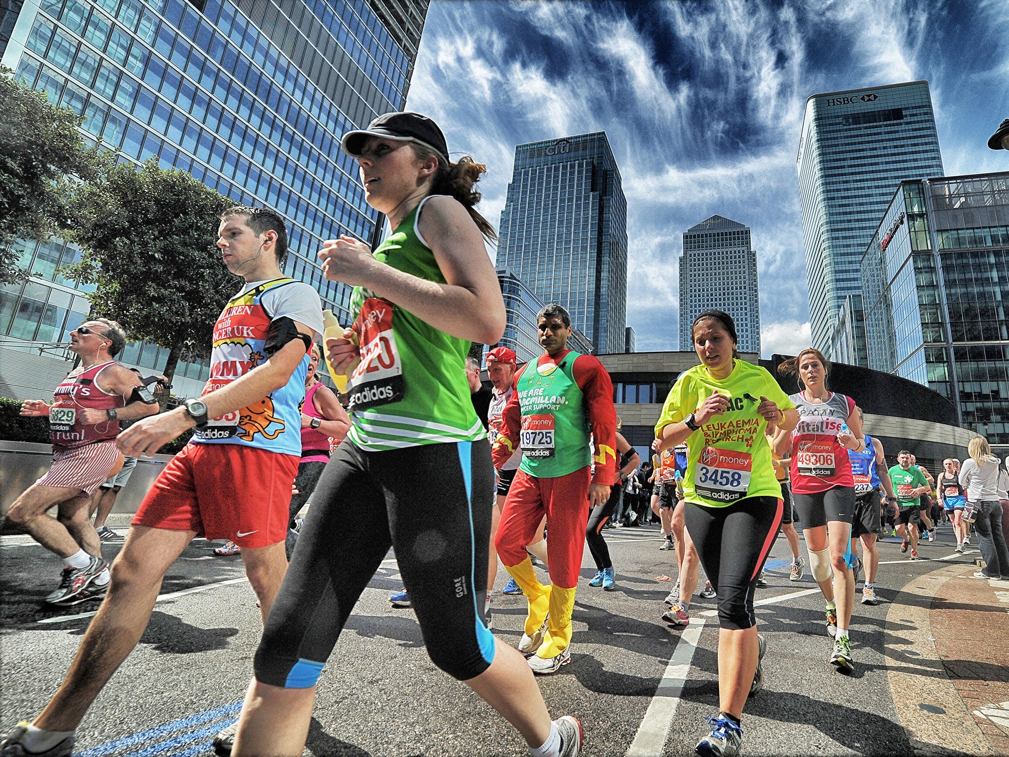 Runners reach the nineteen mile mark of the London Marathon