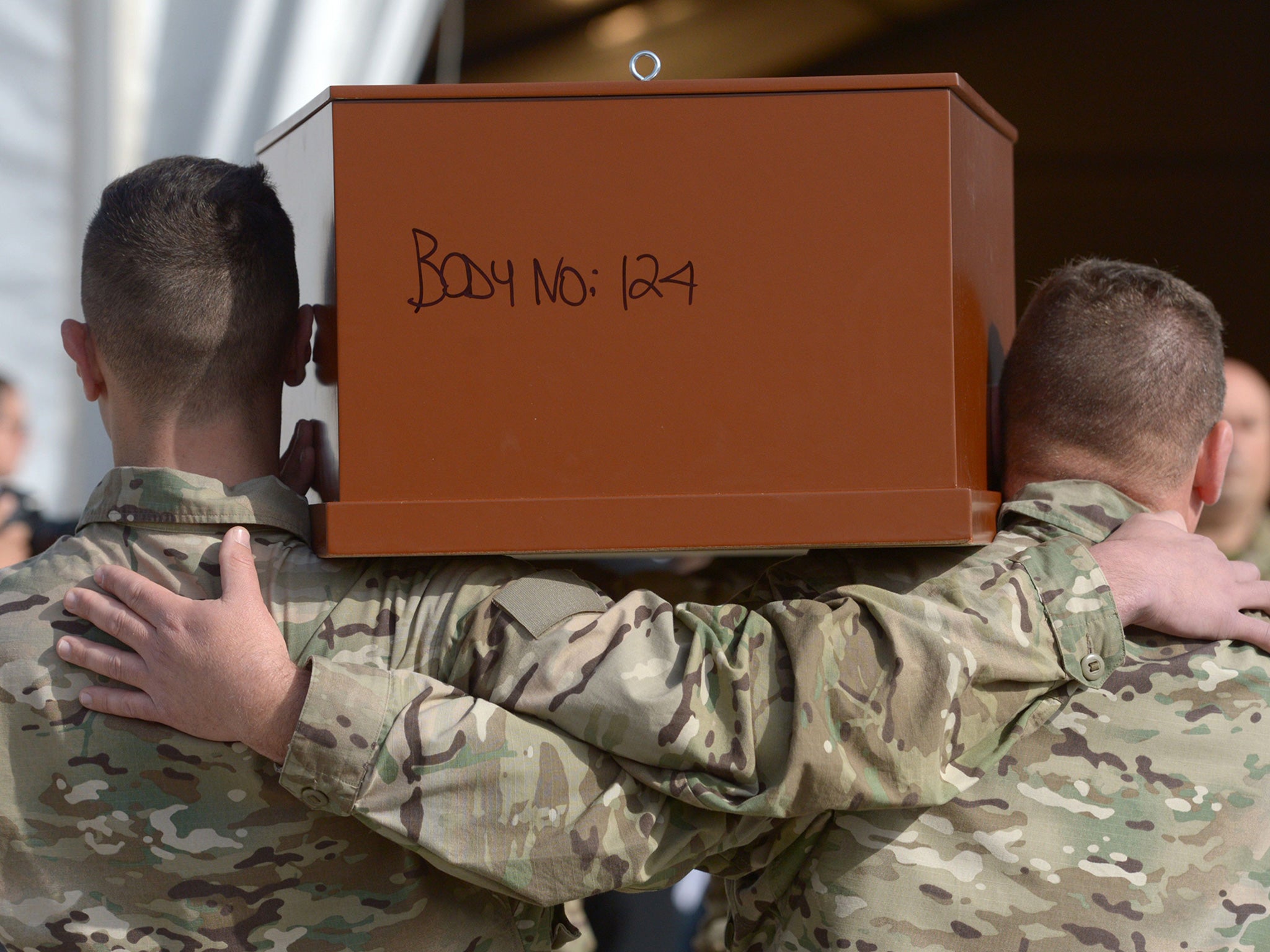 Twenty-four coffins were buried in Msida, Malta in a funeral for some of the migrants who drowned