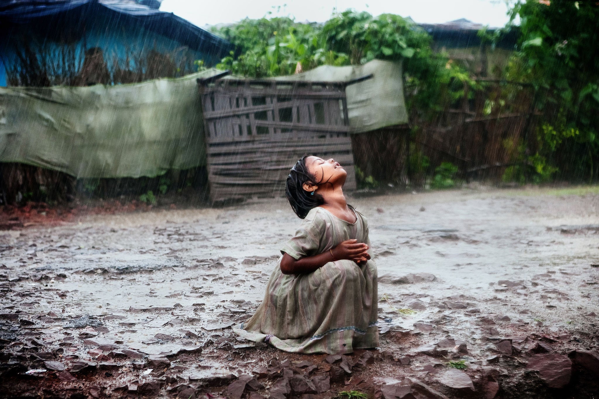 Masi's image showed Poonam, then seven, drenched but ecstatic, face turned to the heavens, haunches trailing in mud