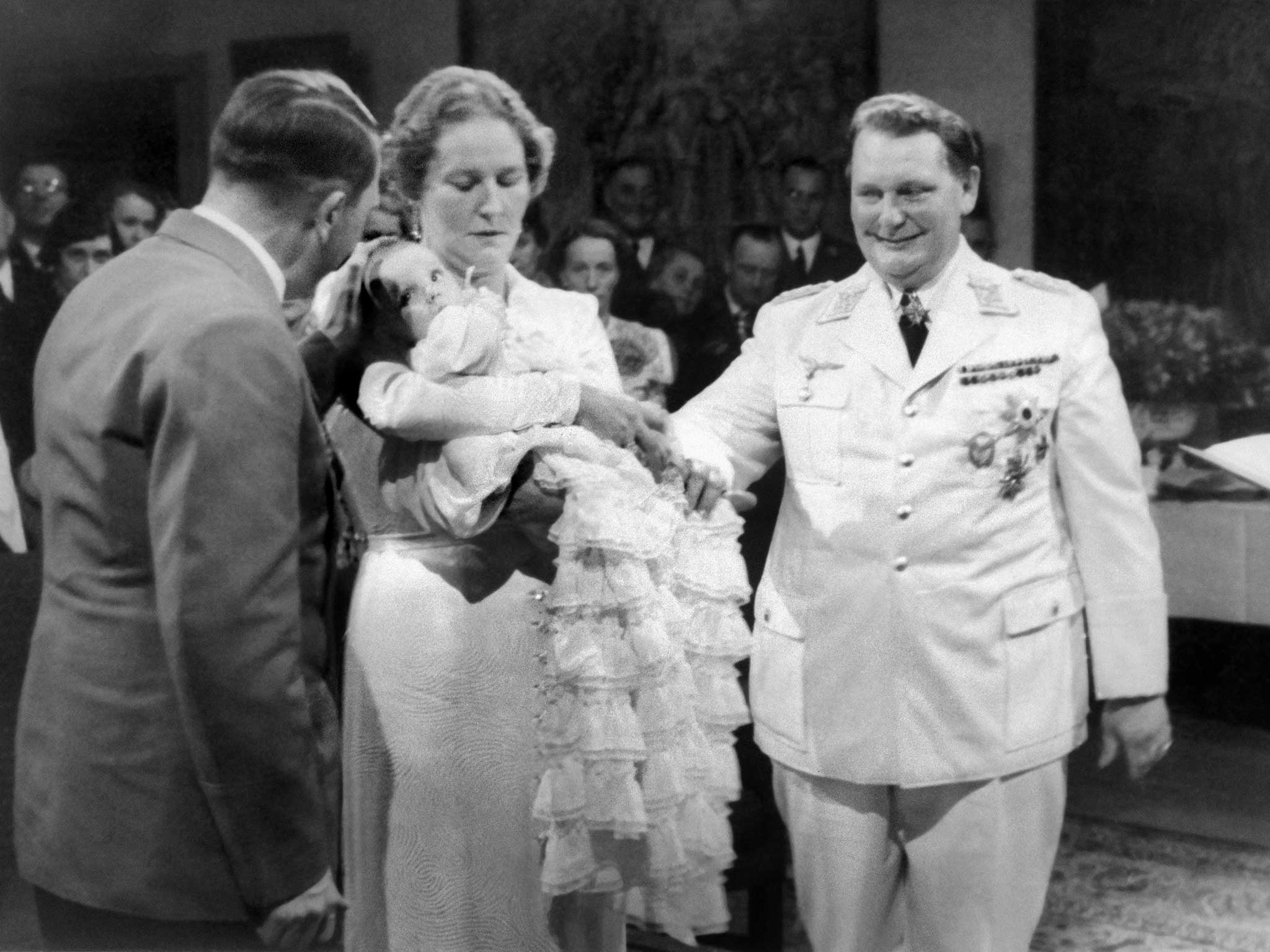 Edda at her christening with her parents, Emmy and Hermann Goering, and Adolf Hitler