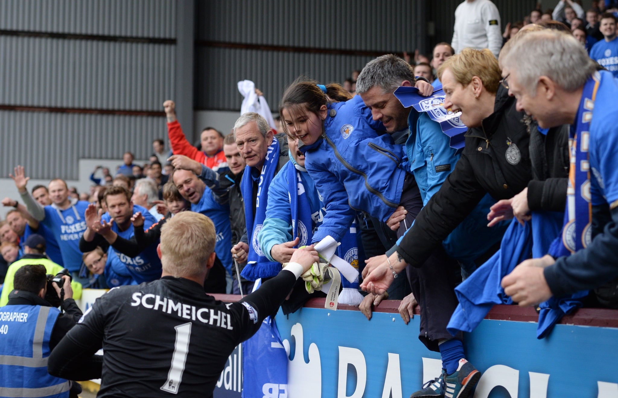 Kasper Schmeichel greets the Leicester fans at full-time