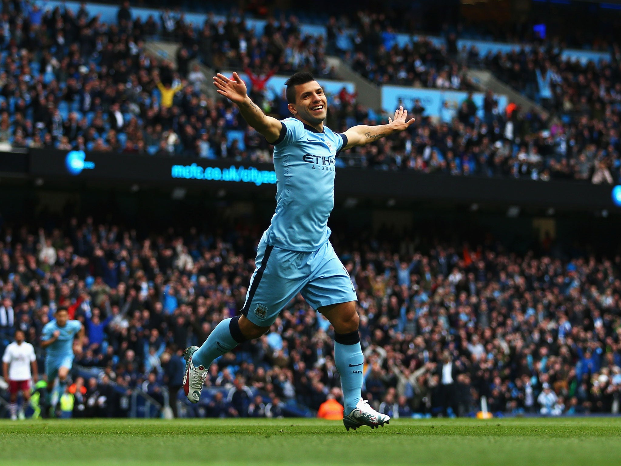 Sergio Aguero celebrates scoring Manchester City's opener