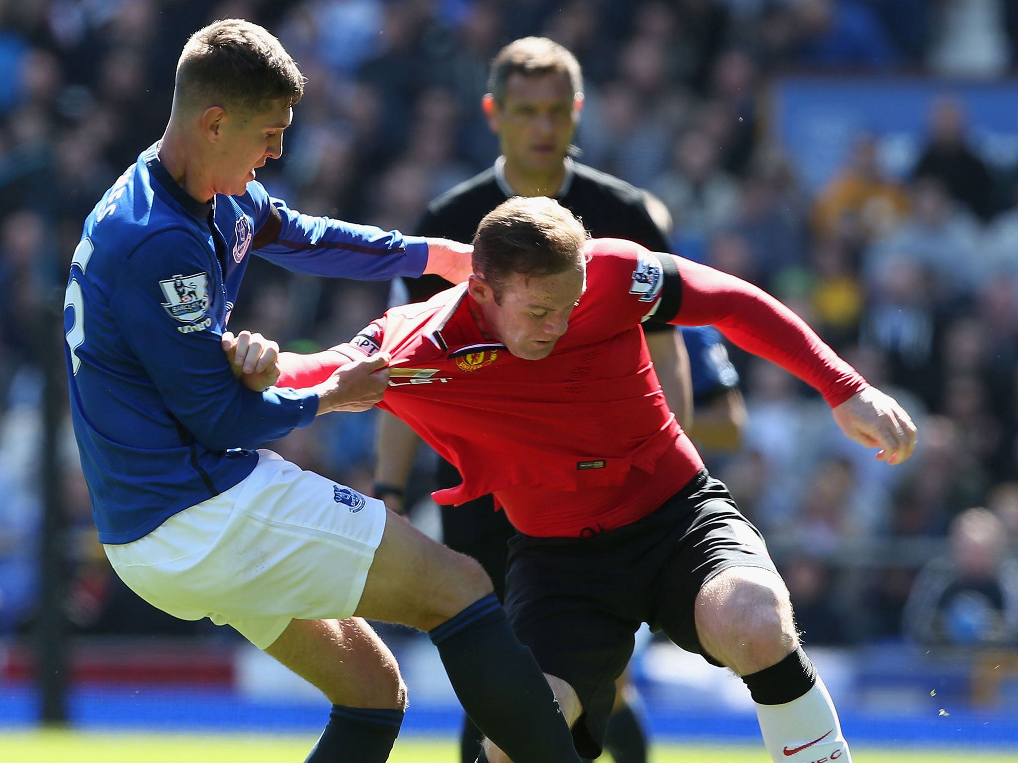 Stones tussles with Wayne Rooney last season