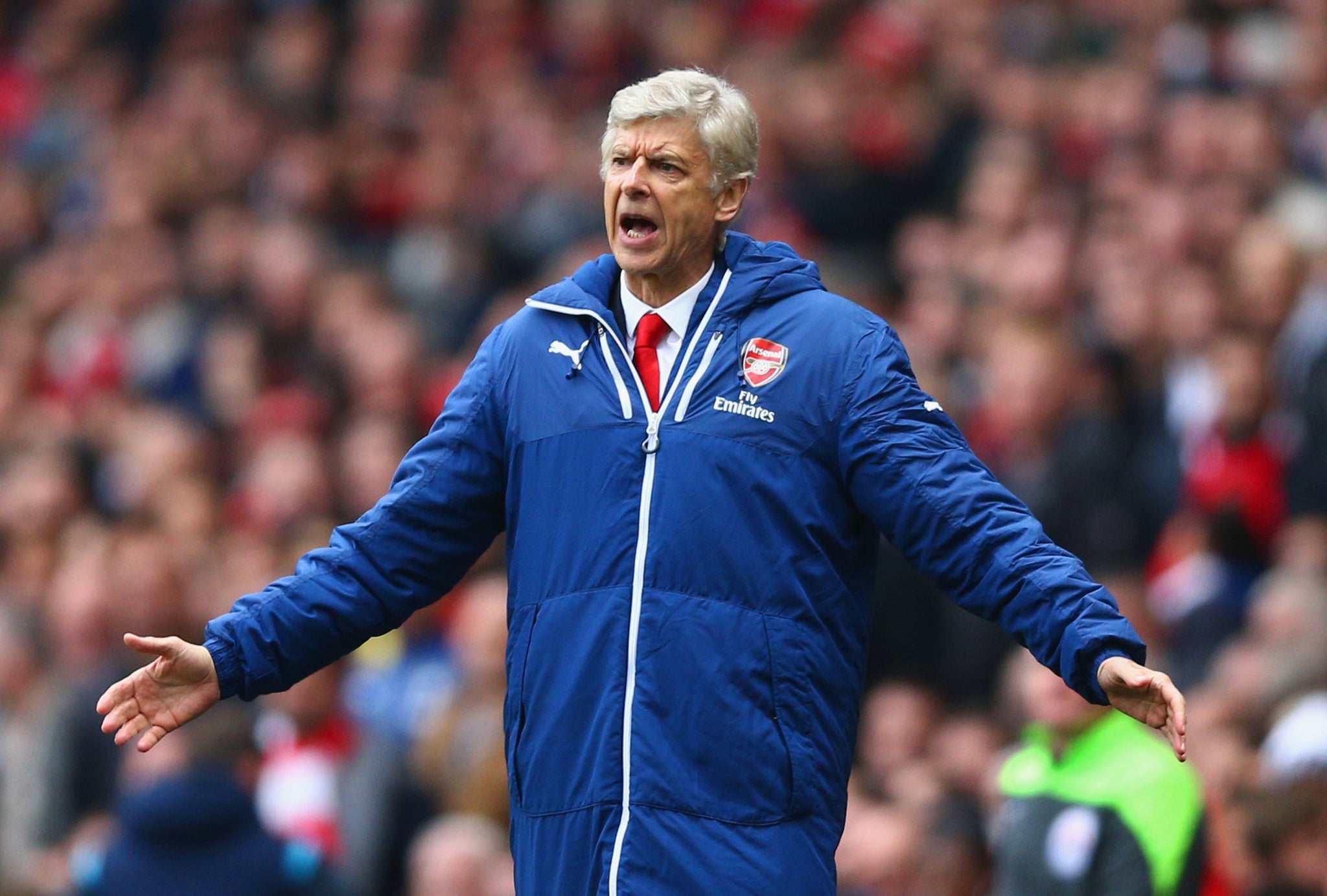 Arsene Wenger reacts on the touchline