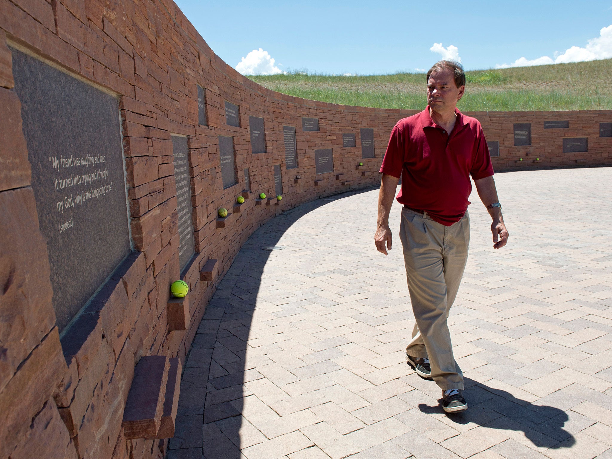 Tom Mauser, wearing his son Daniel’s shoes, at the Columbine Memorial in Colorado