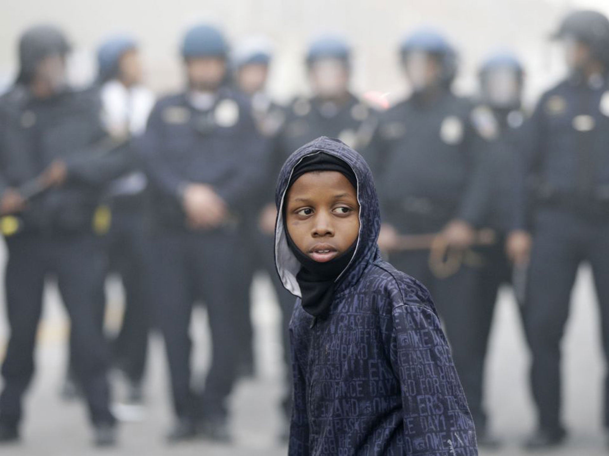 The riots broke out just a few streets from the church where the funeral was held