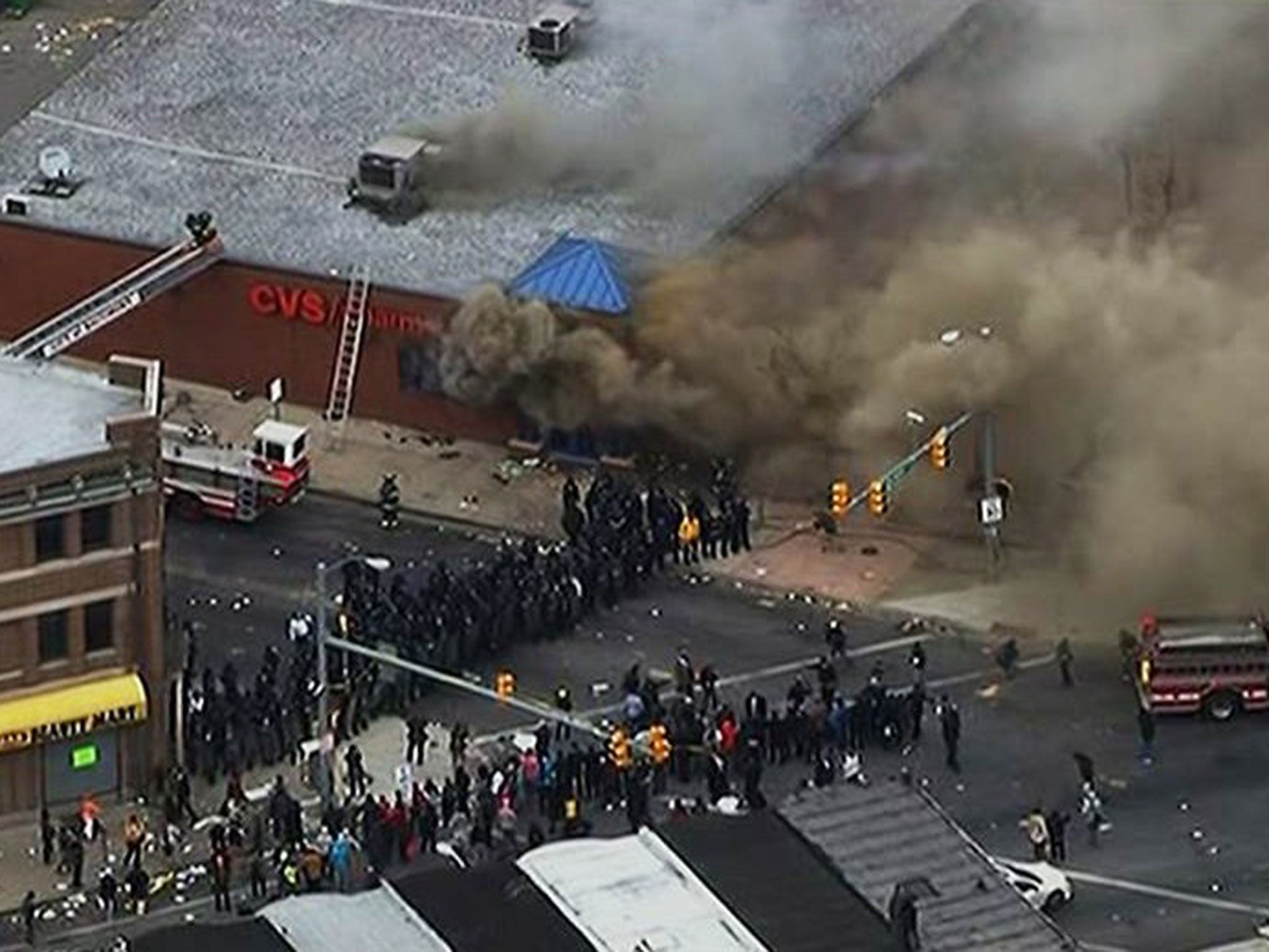 A CVS chemist outlet burns in Baltimore after it was set alight by rioters